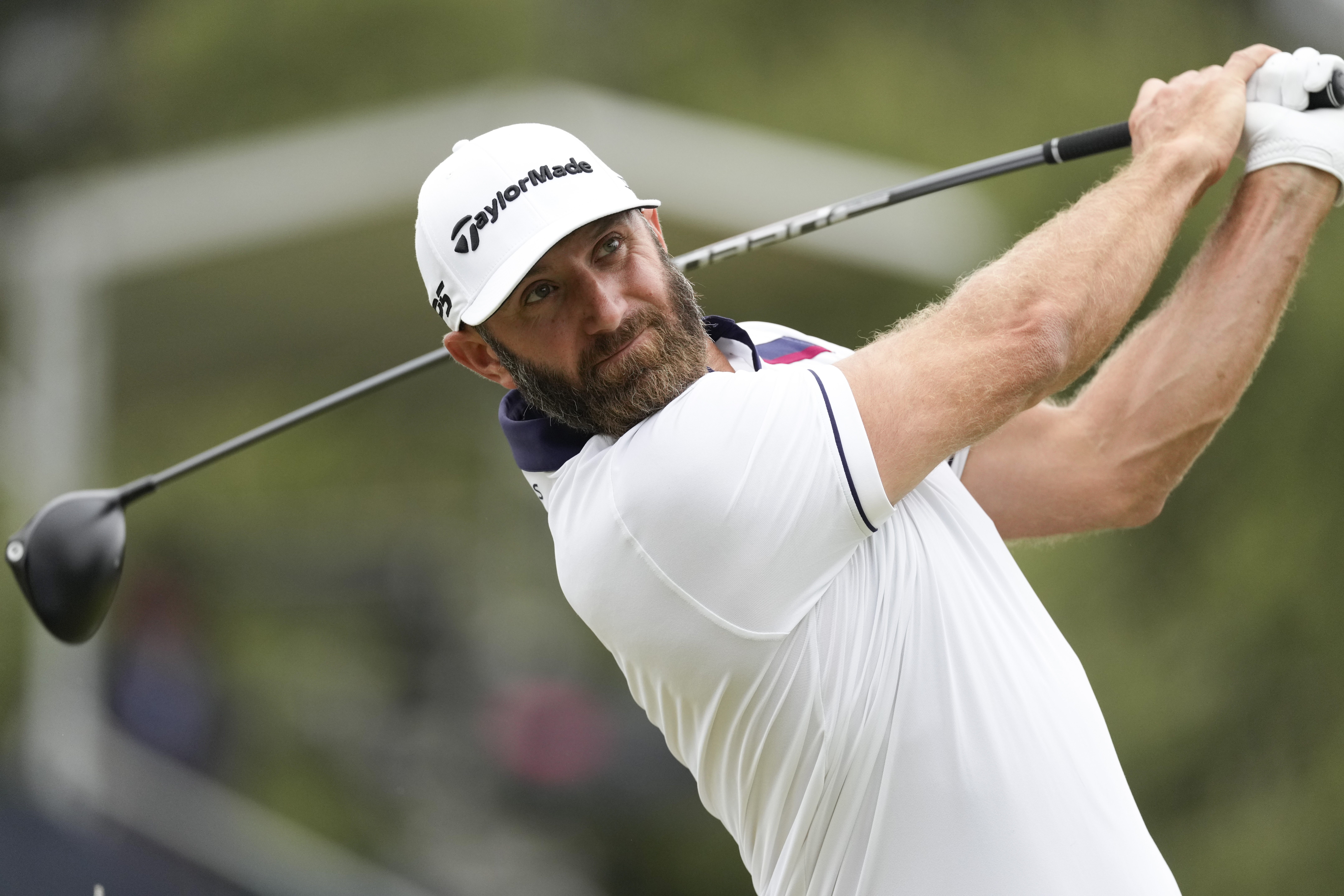 Dustin Johnson watches his tee shot on the fifth hole during the second round of the U.S. Open golf tournament at Los Angeles Country Club on Friday, June 16, 2023, in Los Angeles. 