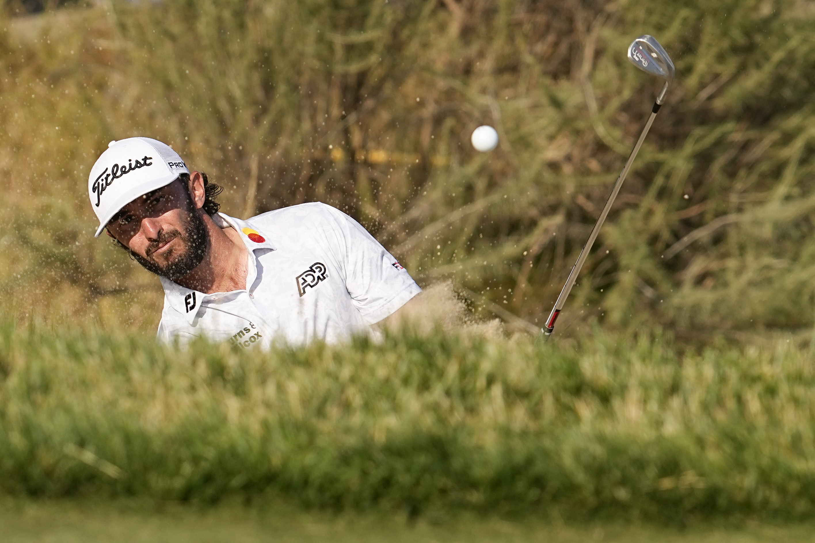 Max Homa chips to the green on the fourth hole during the second round of the U.S. Open golf tournament at Los Angeles Country Club on Friday, June 16, 2023, in Los Angeles. 