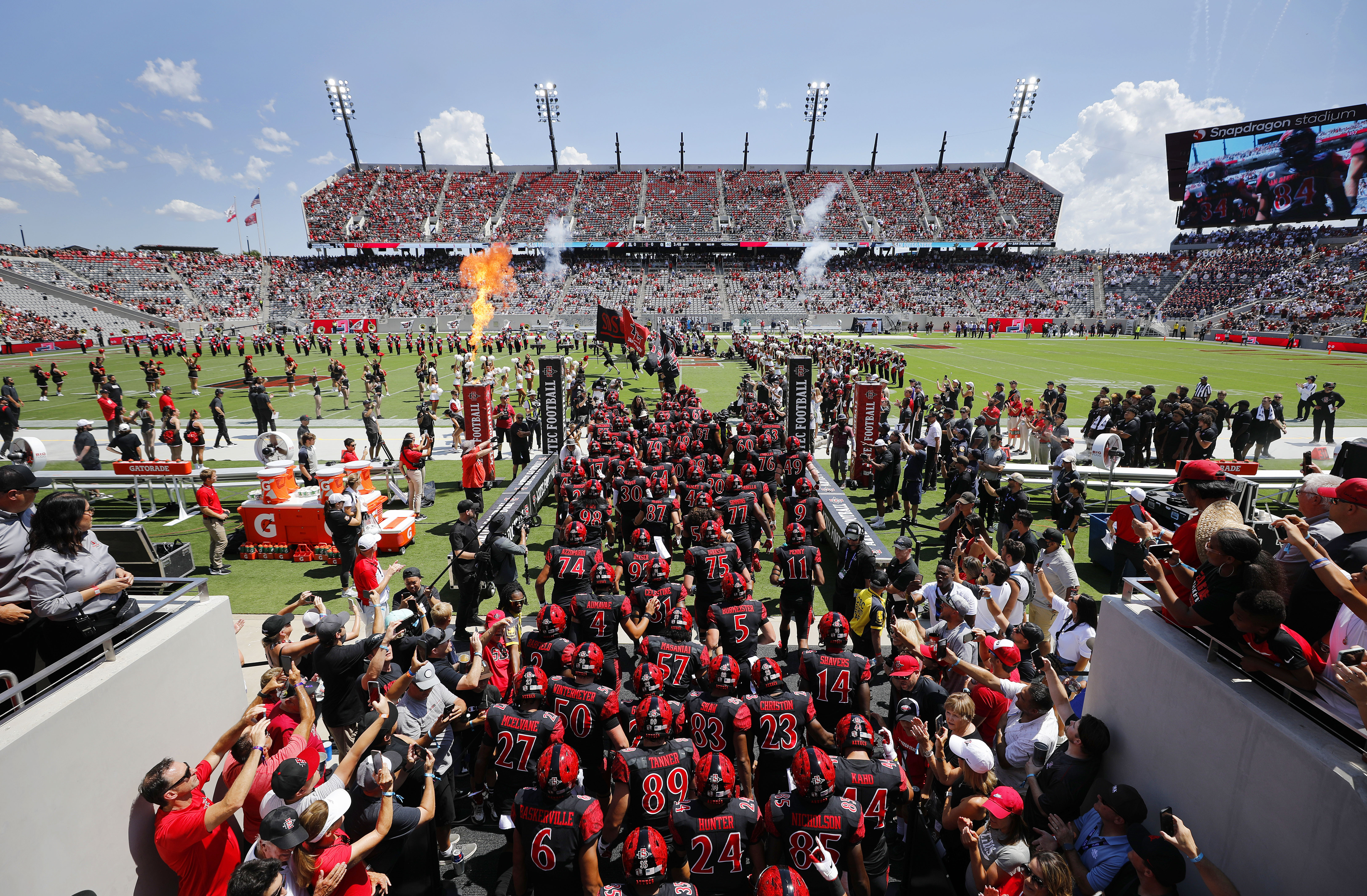 FILE - San Diego State takes the field against Arizona for an NCAA college football game Sept. 3, 2022, in San Diego. San Diego State University has sent a letter to the Mountain West seeking information related to a potential exit next year, according to a person familiar with the situation. The person spoke to The Associated Press on condition of anonymity Friday night, June 16, due to the sensitivity of the situation. 