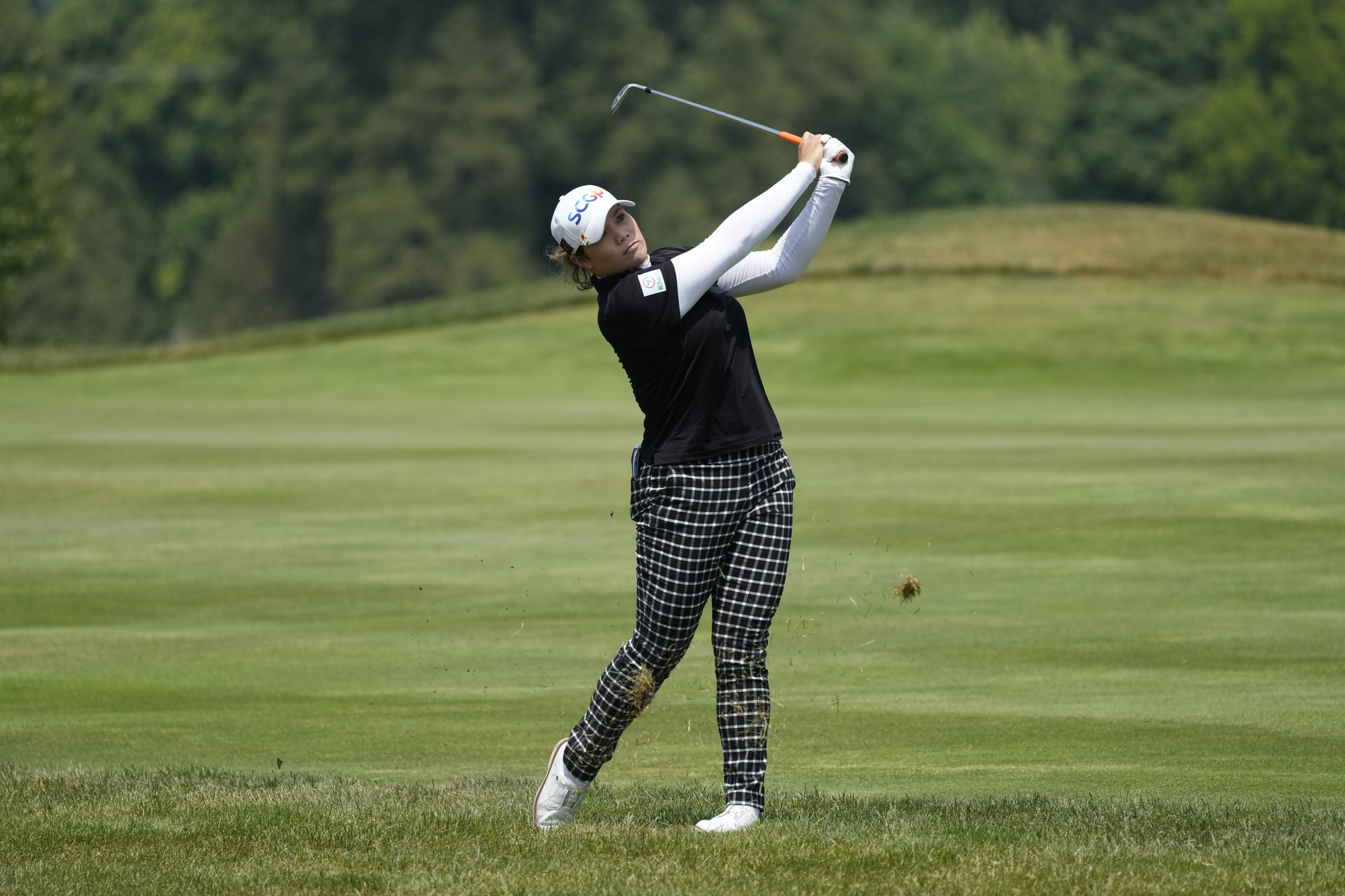 Ariya Jutanugarn of Thailand hits her approach shot onto the second green during the third round of the Meijer LPGA Classic golf tournament at Blythefield Country Club, Saturday, June 17, 2023, in Belmont, Mich. 