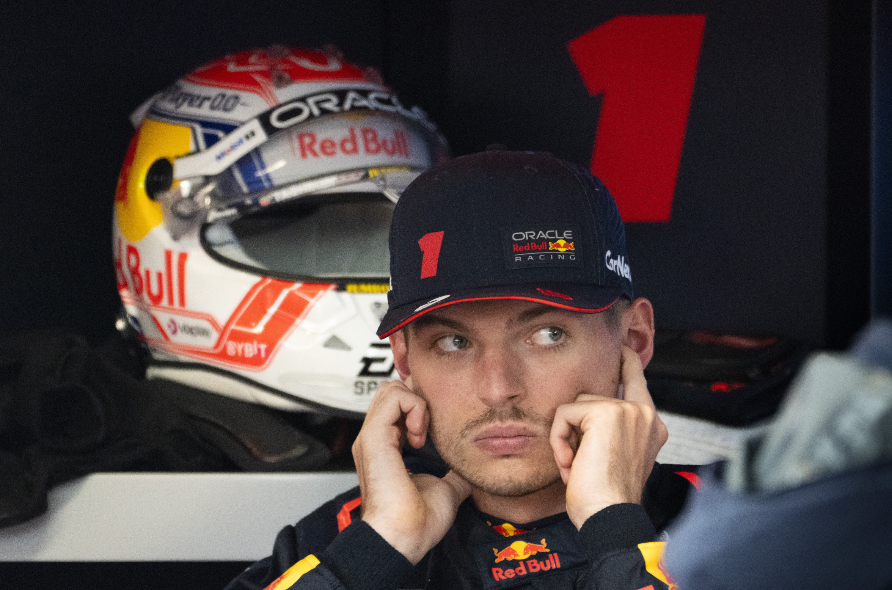 Red Bull Racing Max Verstappen of the Netherlands, proctescts his ears while in his garage prior to hitting the track for the third practice session for the Formula One Canadian Grand Prix, Saturday, June 17, 2023 in Montreal.