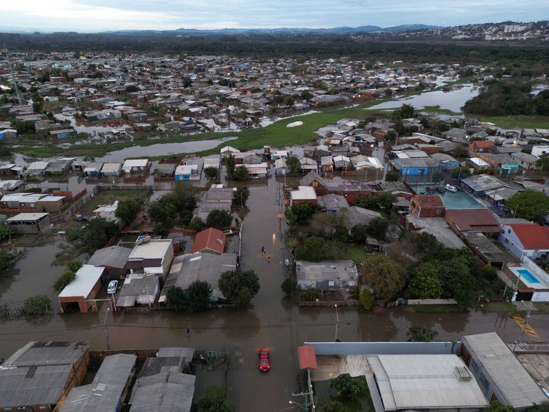 An aerial view shows damage and floods due to heavy rains after an extra-tropical cyclone, in Sao Leopoldo, Rio Grande do Sul state, Brazil on Saturday.