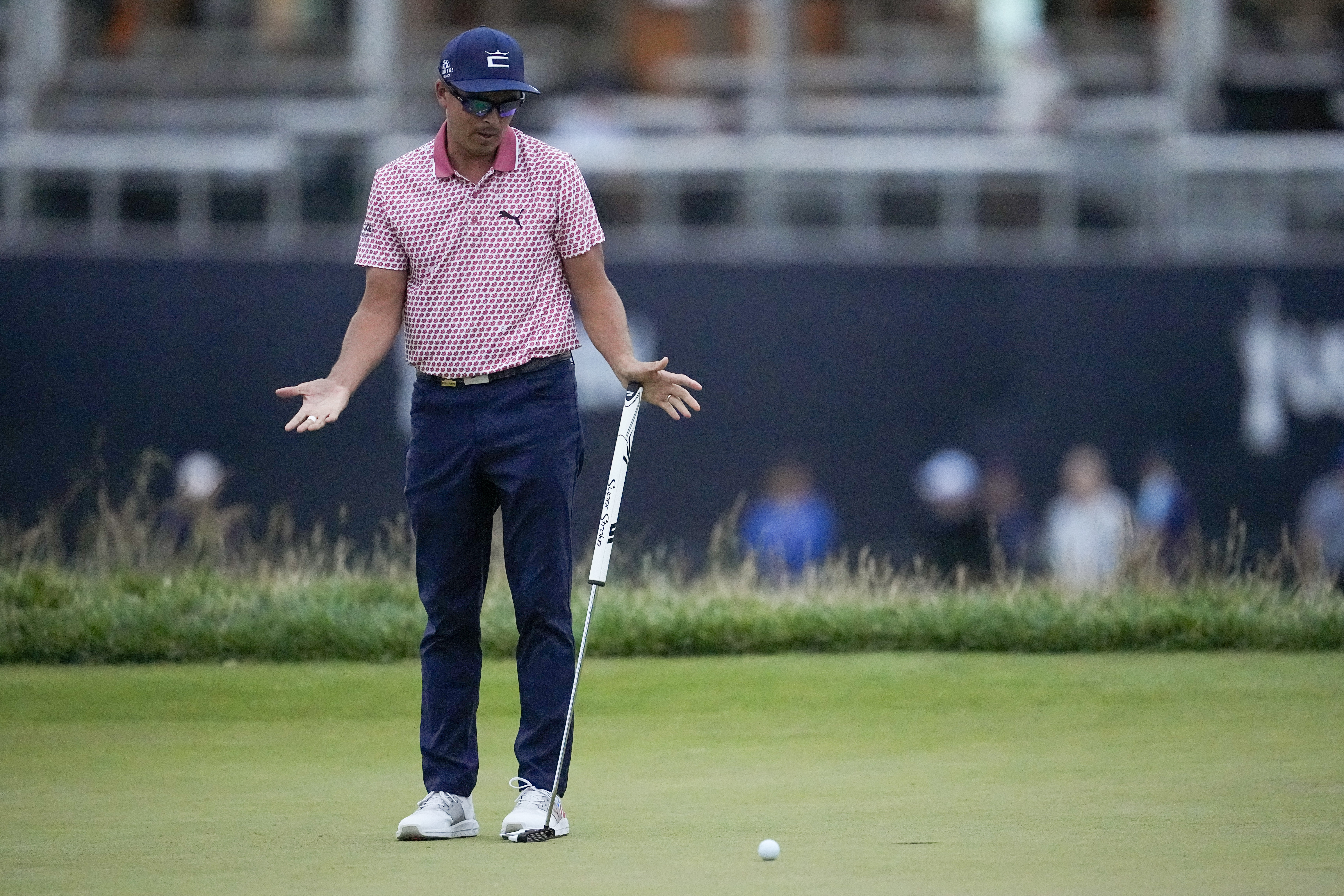 CORRECTS TO RICKIE FOWLER NOT RORY MCILROY - Rickie Fowler reacts after missing a putt on the 18th hole during the third round of the U.S. Open golf tournament at Los Angeles Country Club on Saturday, June 17, 2023, in Los Angeles. 