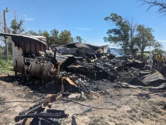 A man died in a house fire in Iron County on Sunday, authorities said, while possibly trying to save a dog.