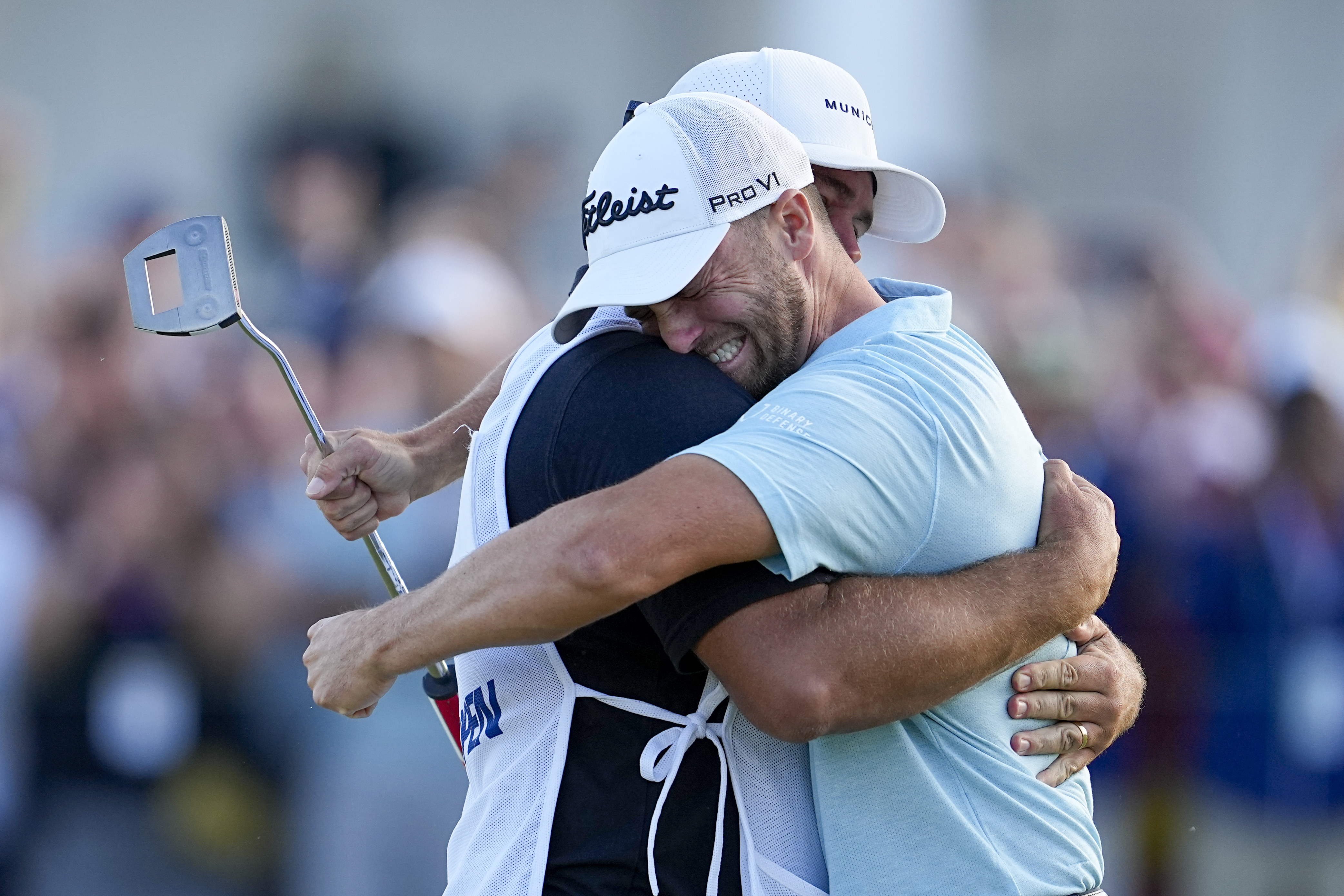Wyndham Clark celebrates with his caddie after winning after the U.S. Open golf tournament at Los Angeles Country Club on Sunday, June 18, 2023, in Los Angeles. 