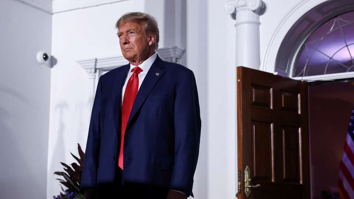 Former U.S. President Donald Trump reacts on stage following his arraignment on classified document charges, at Trump National Golf Club, in Bedminster, New Jersey, June 13.
