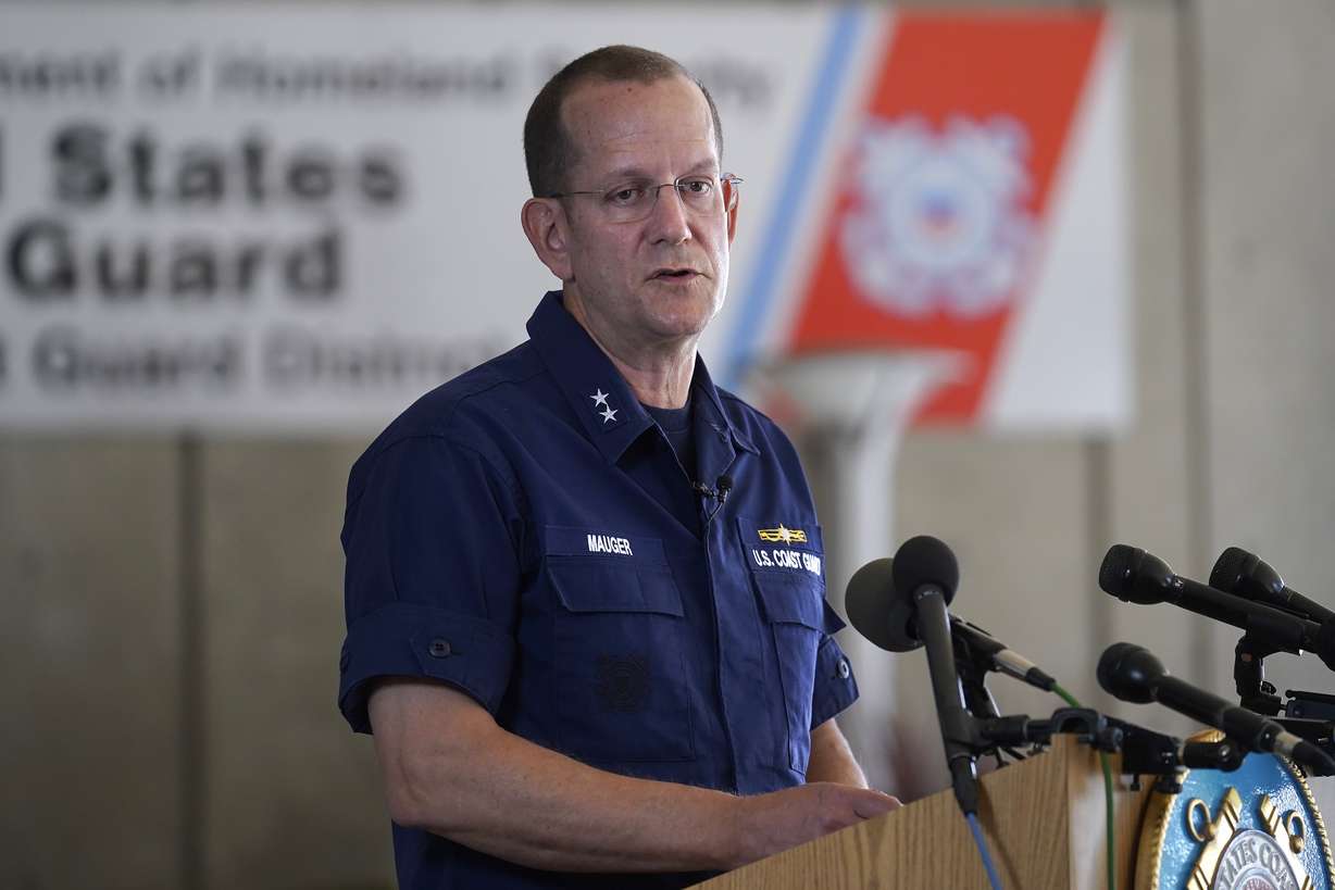 U.S. Coast Guard Rear Adm. John Mauger, commander of the First Coast Guard District, speaks to the media, Monday, in Boston. A search is underway for a missing submersible that carries people to view the wreckage of the Titanic.
