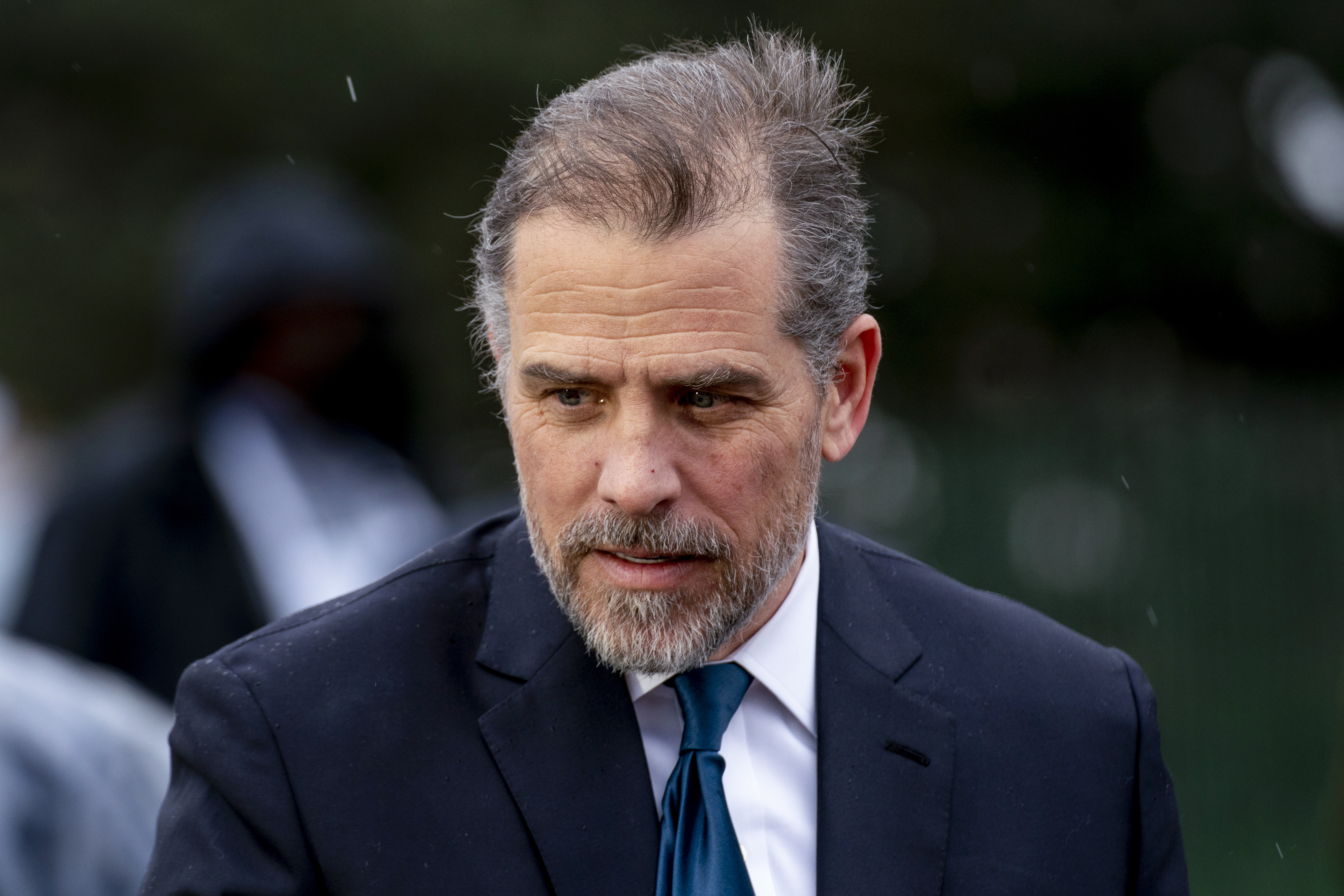 Hunter Biden, the son of President Joe Biden, speaks to guests during the White House Easter Egg Roll on the South Lawn of the White House, April 18, 2022, in Washington. He has been charged with failing to pay federal income tax and illegally possessing a weapon and has reached an agreement with the Justice Department.