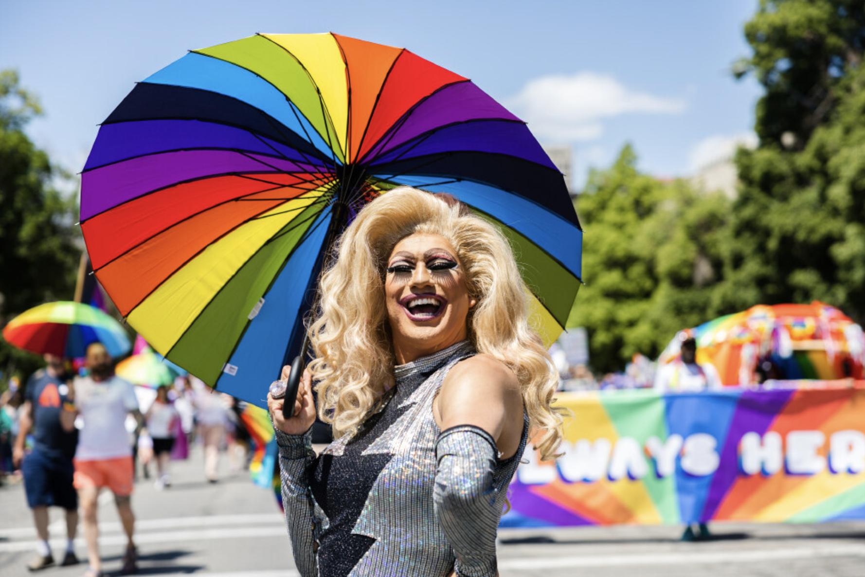 A drag queen walks during the 2023 Utah Pride Parade in downtown Salt Lake City on June 4. A federal judge has granted the request Friday of a Utah-based group that organizes drag performances for a preliminary injunction, directing the city of St. George to issue a permit for the group to host an all-ages drag show in a public park and calling the attempt of city officials to stop the show unconstitutional. 