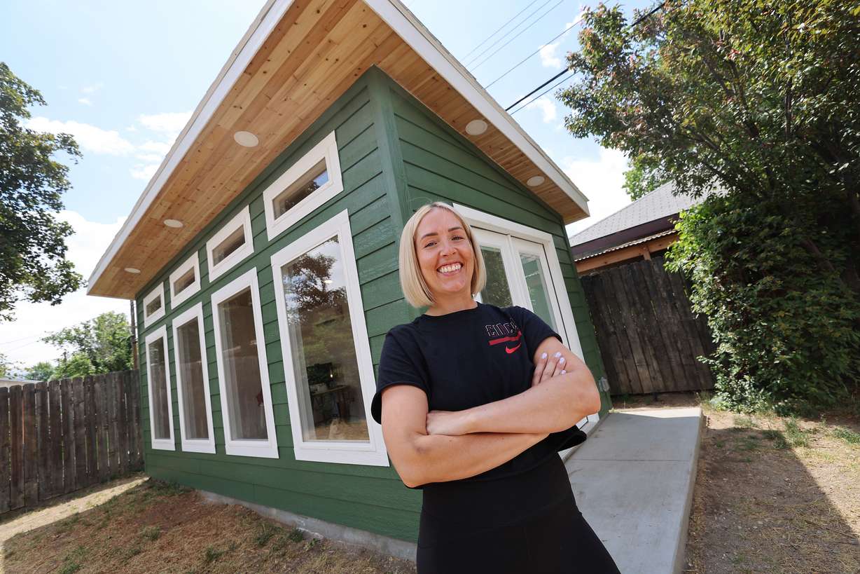 Sydney Jones poses for a photo outside her new backyard office on June 20.