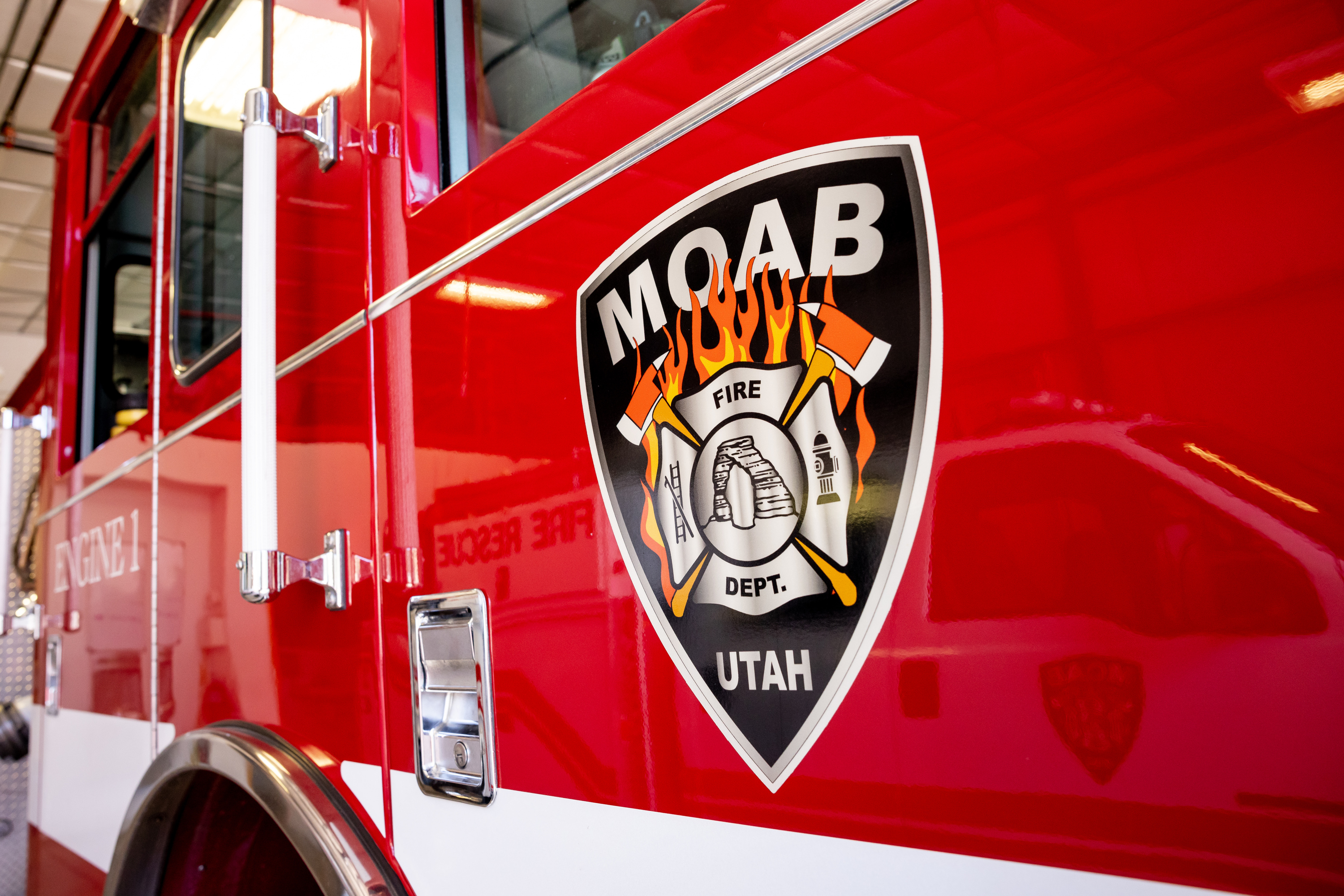 A grass fire is affecting traffic on I-70 near the Utah-Colorado border in Grand County on Tuesday.