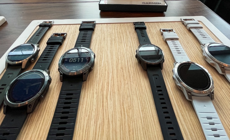Garmin watches are displayed at an Outdoor Retailer event on Sunday. The watches on the left side are the latest iteration of the company's solar-powered watches.