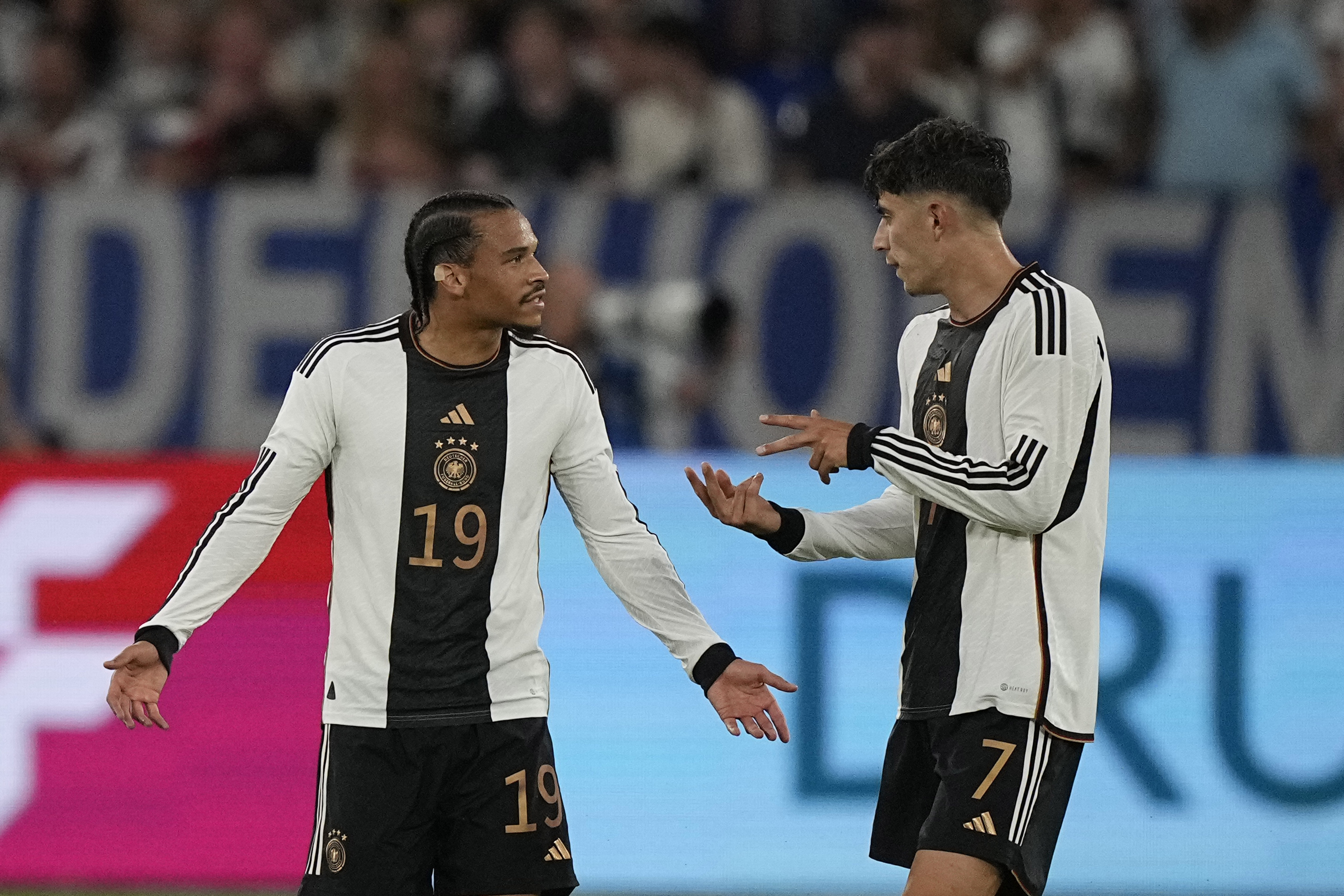 Germany's Leroy Sane, left, argues with his teammate Kai Havertz after Colombia's Luis Diaz scores his side's opening goal during an international friendly soccer match between Germany and Colombia at Veltins-Arena, in Gelsenkirchen, Germany, Tuesday, June 20, 2023. 