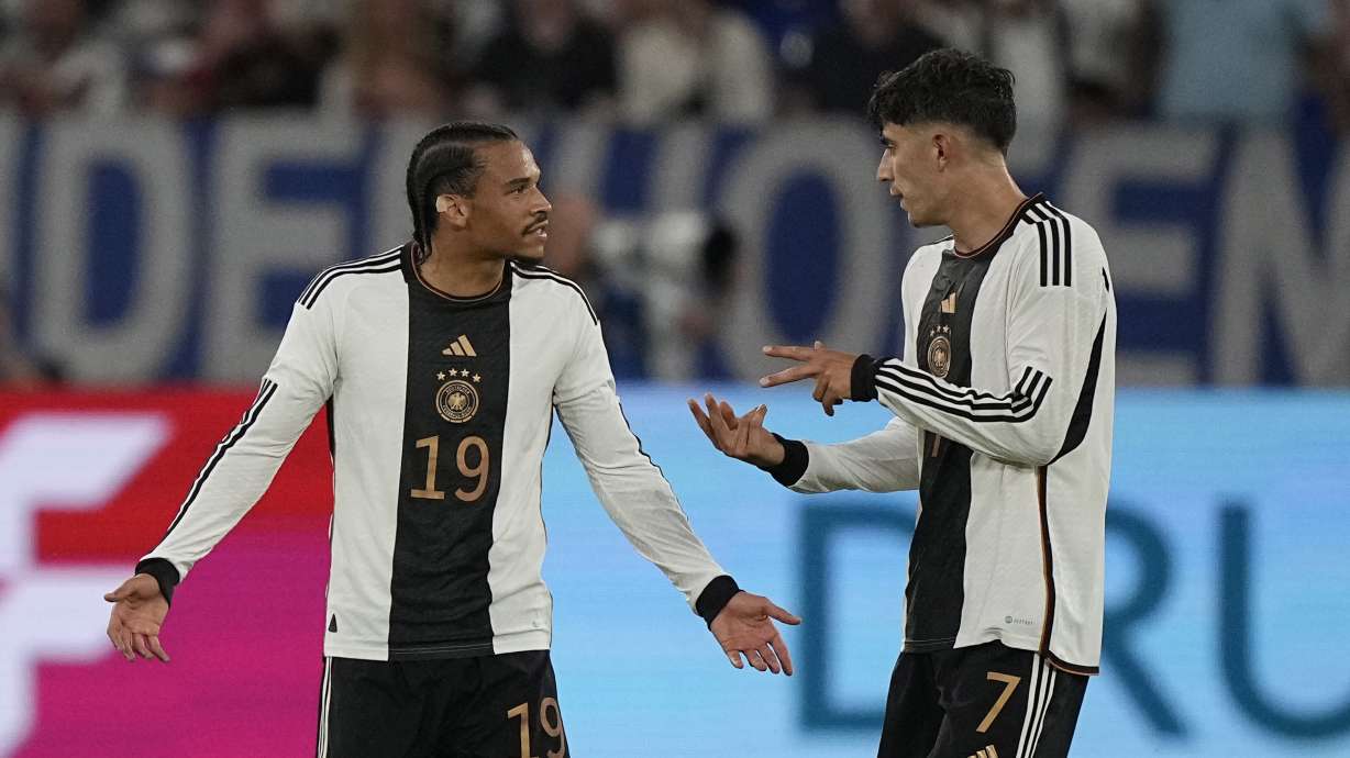 Germany's Leroy Sane, left, argues with his teammate Kai Havertz after Colombia's Luis Diaz scores his side's opening goal during an international friendly soccer match between Germany and Colombia at Veltins-Arena, in Gelsenkirchen, Germany, Tuesday, June 20, 2023.