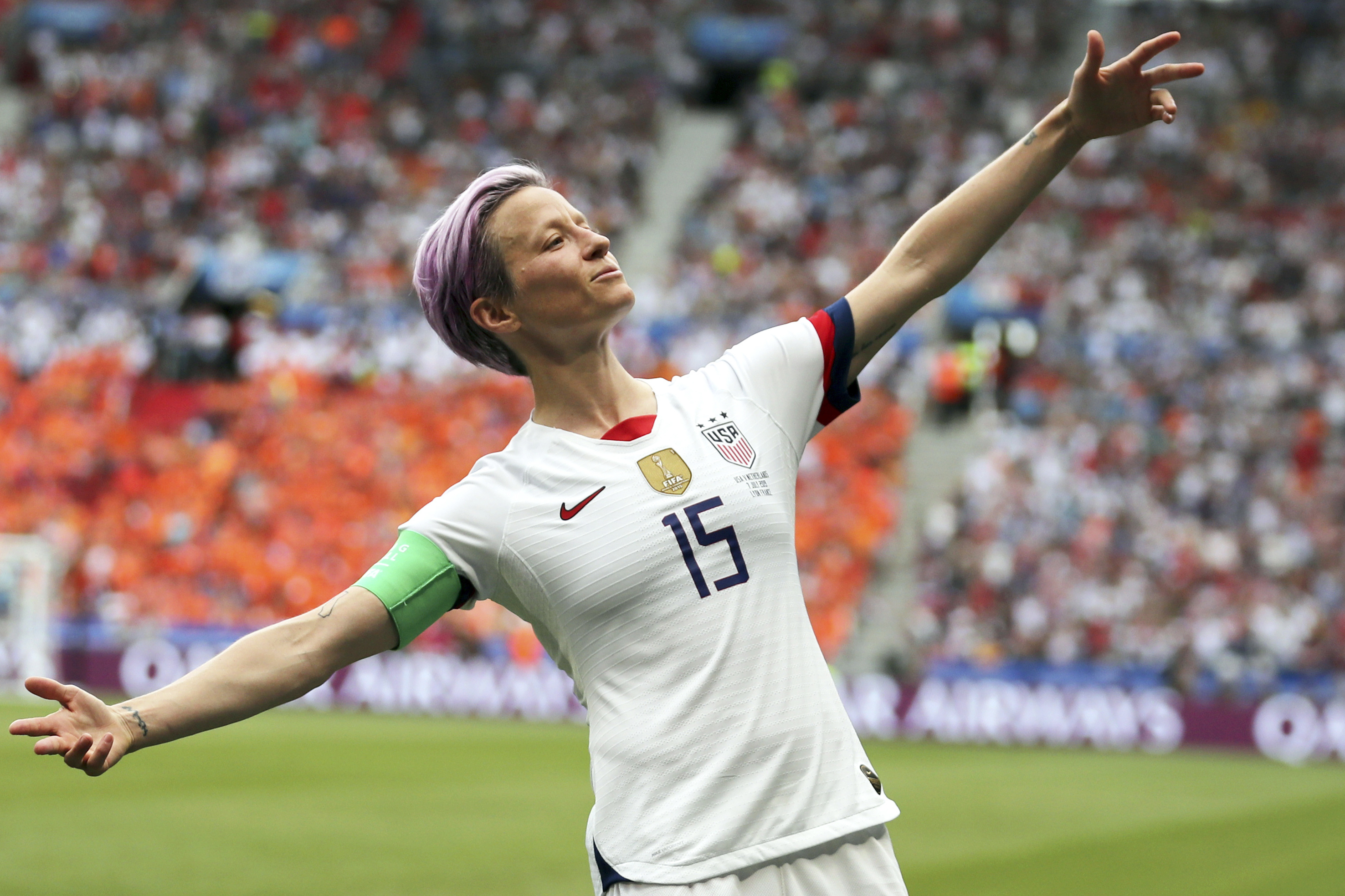 FILE - In this July 7, 2019 file photo, United States' Megan Rapinoe celebrates after scoring the opening goal from the penalty spot during the Women's World Cup final soccer match against The Netherlands at the Stade de Lyon in Decines, outside Lyon, France.