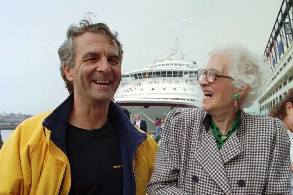 Commander Paul-Henry Nargeolet, left, laughs with Millvina Dean, 84, of England at the Black Falcon Pier in Boston on Sept.1, 1996. Nargeolet is aboard a submersible that vanished while taking five people down to the wreck of the Titanic.
