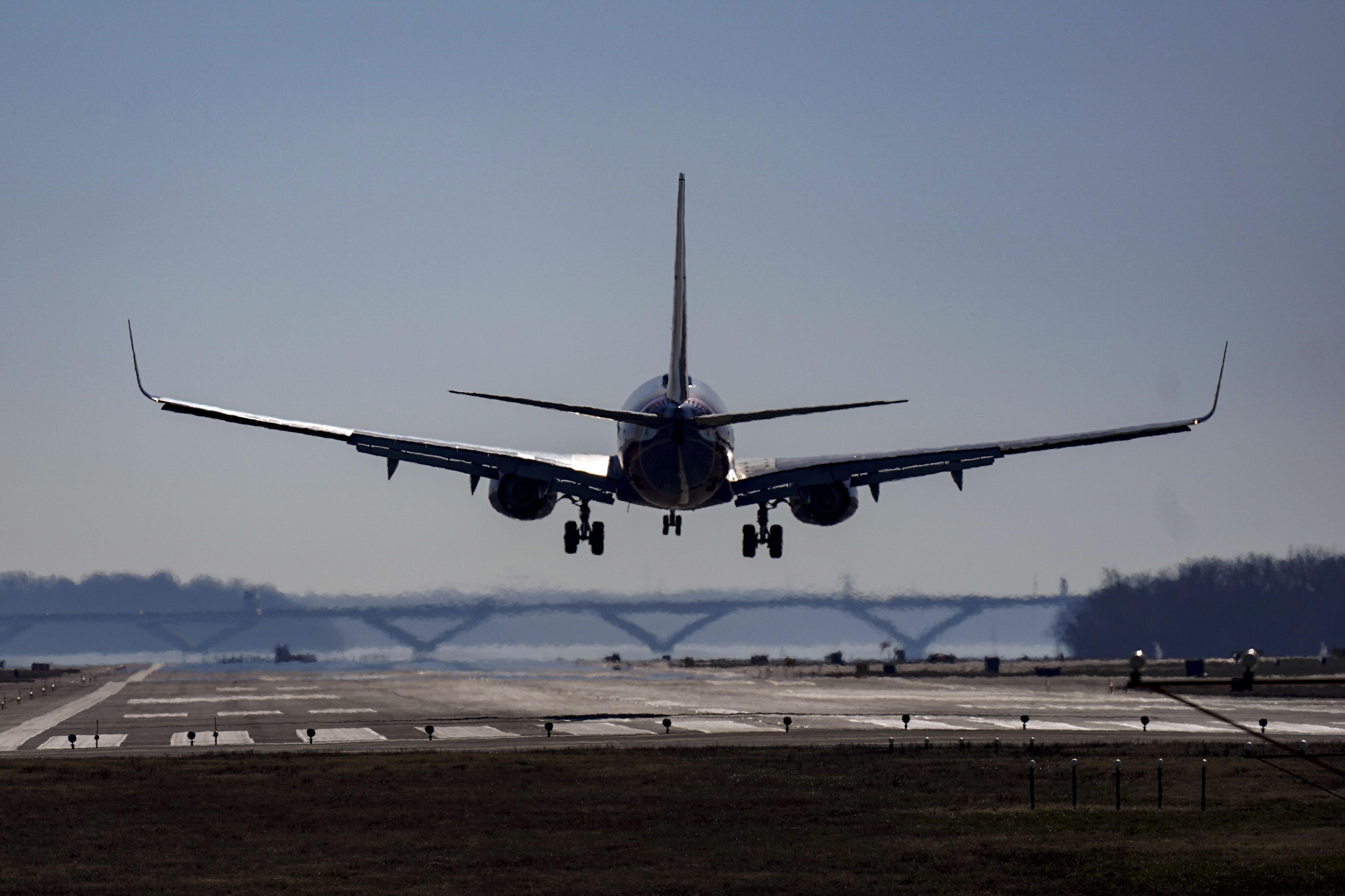 A Southwest plane lands at Ronald Reagan Washington National Airport in Arlington, Va., Dec. 30, 2022. The six members of Utah's all-Republican congressional delegation say they support an effort to add flights into Ronald Reagan Washington National Airport. 