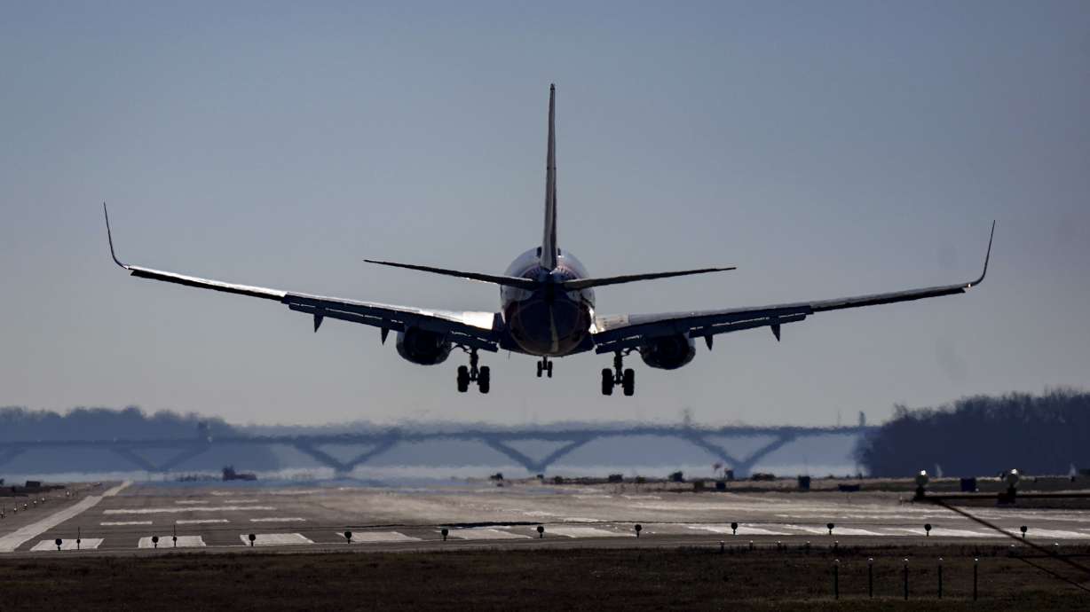 A Southwest plane lands at Ronald Reagan Washington National Airport in Arlington, Va., Dec. 30, 2022. The six members of Utah's all-Republican congressional delegation say they support an effort to add flights into Ronald Reagan Washington National Airport.