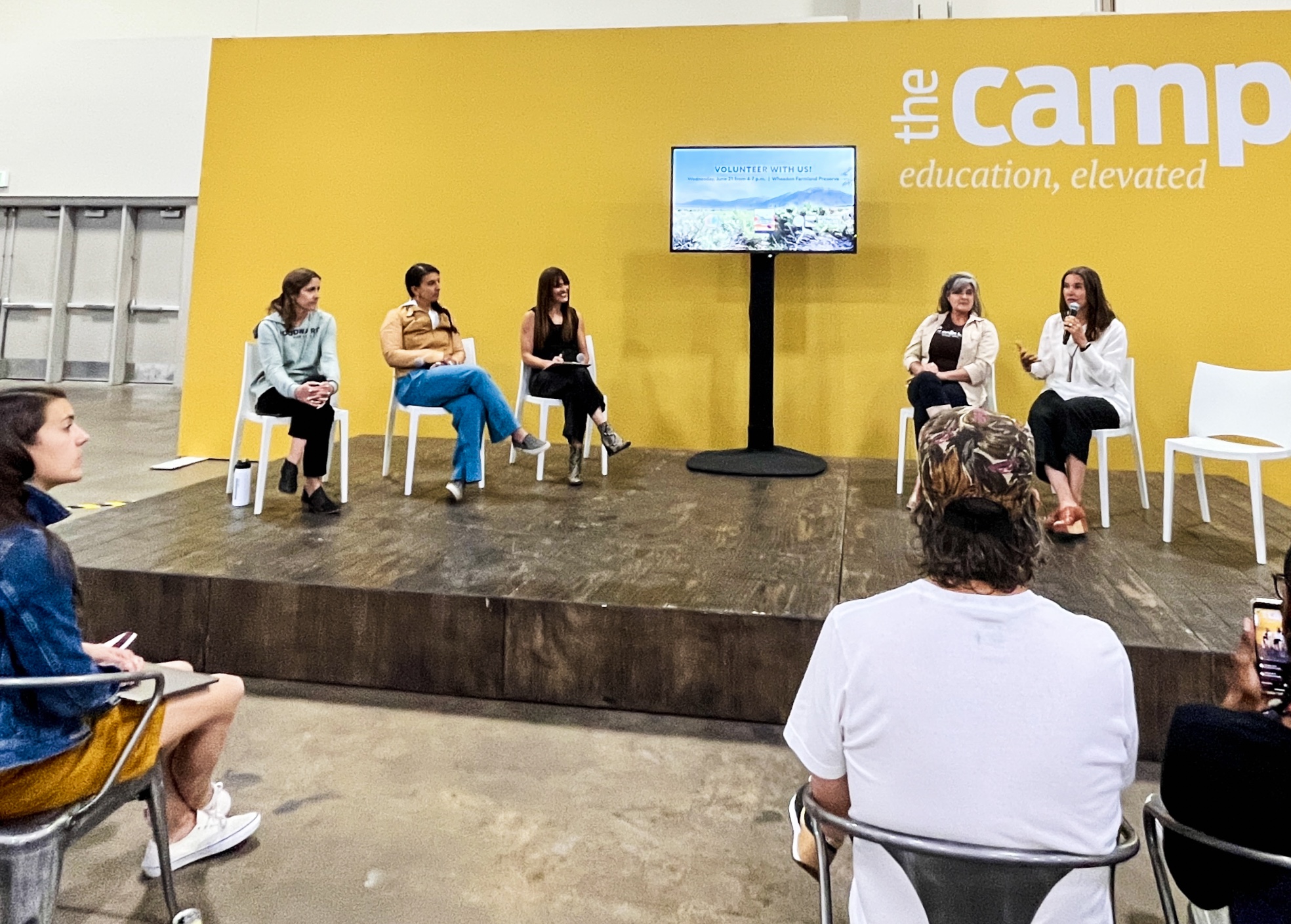 Salt Lake City Mayor Erin Mendenhall, right, speaks during a panel discussion on climate at Outdoor Retailer in Salt Lake City Wednesday morning.