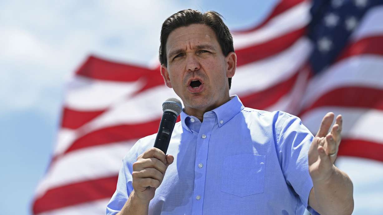 A federal judge has struck down Florida rules championed by Florida Gov. Ron DeSantis, seen here June 17, restricting Medicaid coverage for transgender treatments.