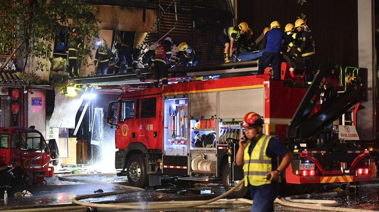 Firefighters work at the site of an explosion at a restaurant in Yinchuan, northwest China's Ningxia Hui Autonomous Region in the early hours of Wednesday. A massive cooking gas explosion killed dozens and injured some, Chinese authorities said Thursday.