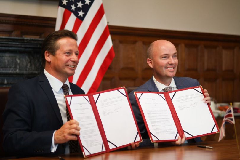 Utah Gov. Spencer J. Cox poses for a photo with the United Kingdom’s Trade Minister Nigel Huddleston on Thursday after signing a memorandum to encourage trade and investment with the United Kingdom.