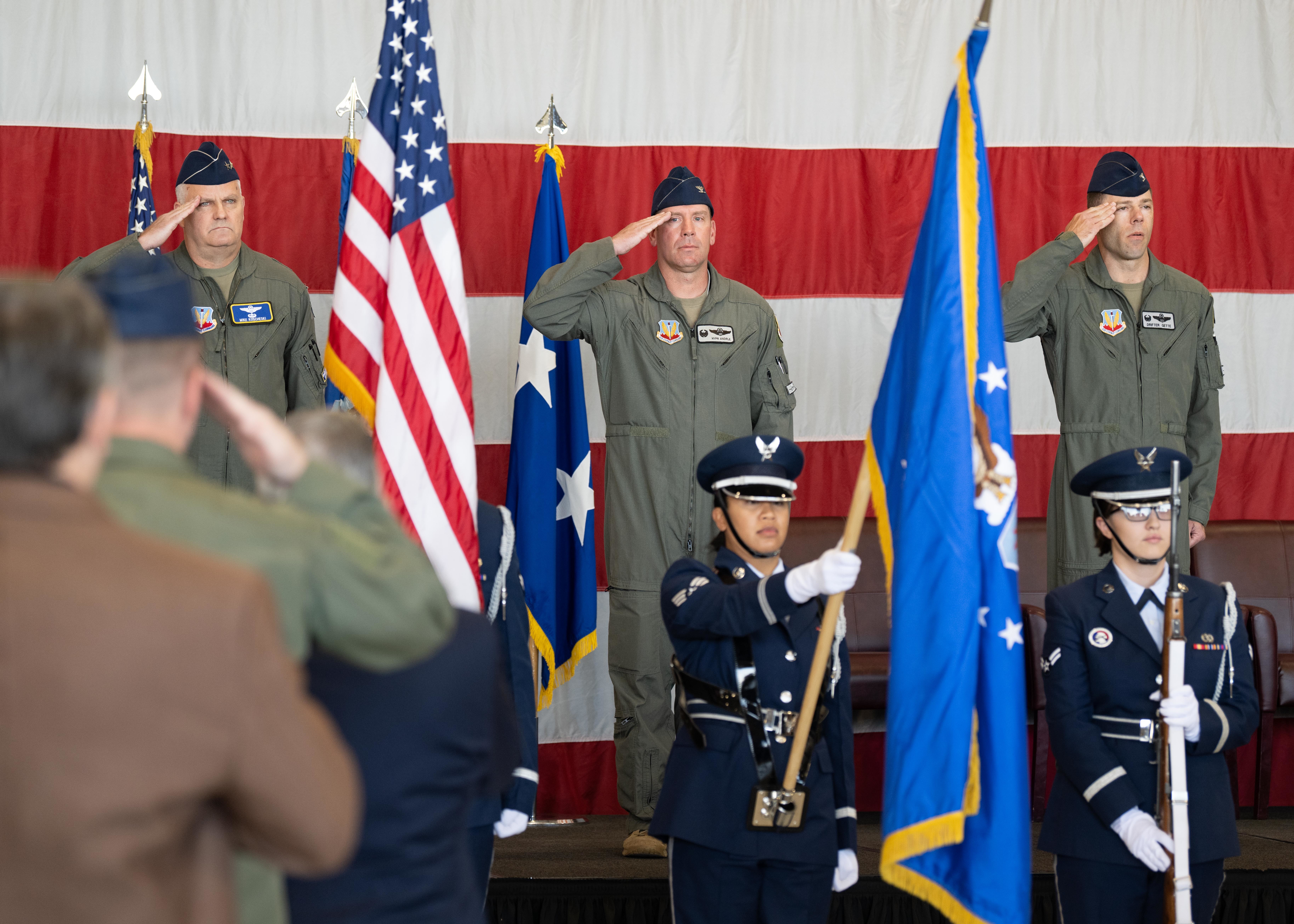 Mj. Gen. Michael G. Koscheski, Col. Craig Andrle and Col. Michael Gette salute the airmen of the 388th Fighter Wing at the Hill Air Force Base on Thursday. Gette replaced Andrle as the new commander at the base.
