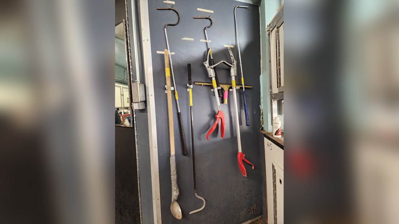 The various tools of the trade for handling and cleaning up after venomous snakes in the small animals building at Utah's Hogle Zoo, in Salt Lake City.