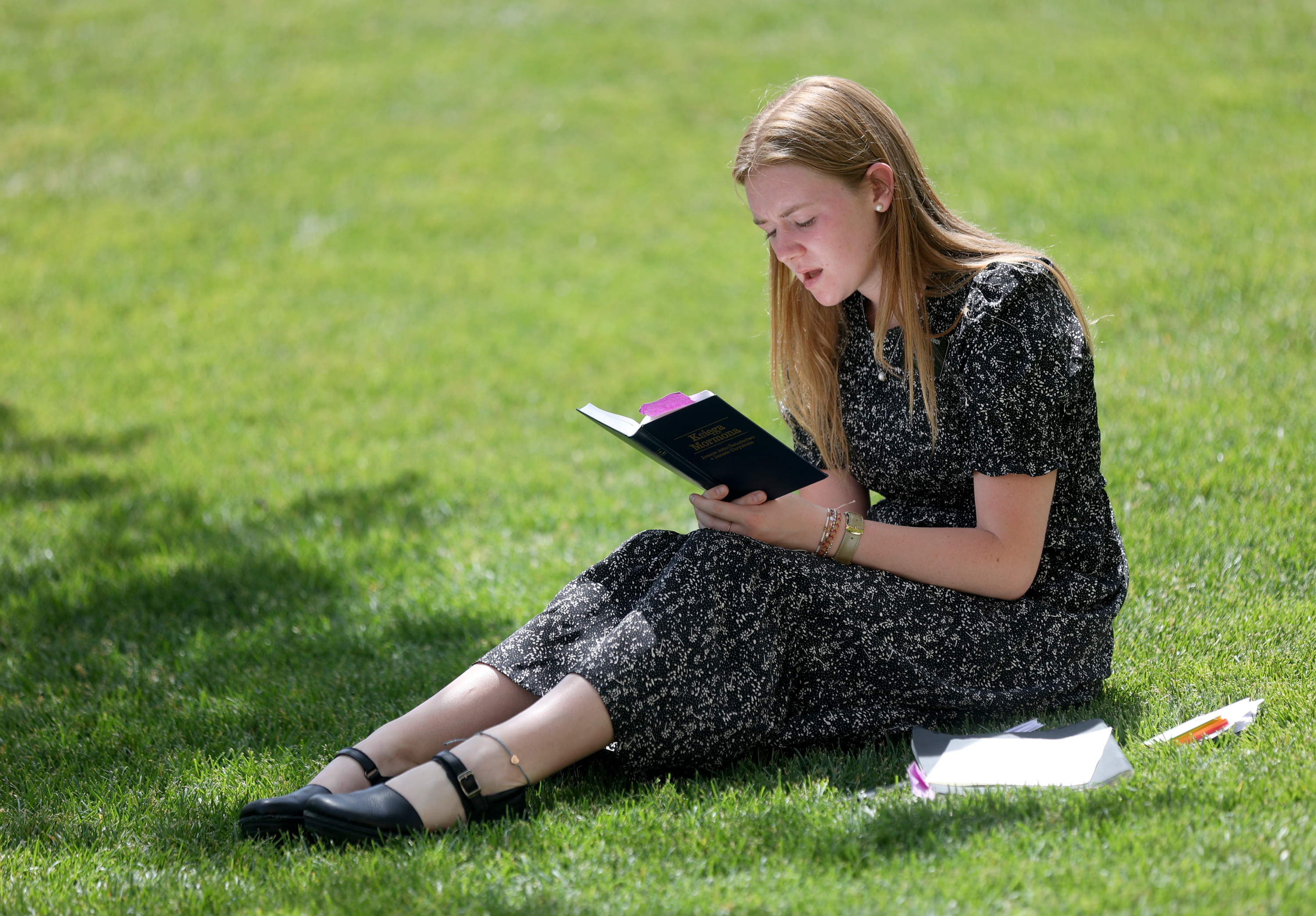 Sister Natalee Cannon, from Falls Church, Va., reads the Book of Mormon out loud in Polish to work on her pronunciation as she prepares to serve a mission in Warsaw, Poland, at the Missionary Training Center in Provo on Thursday.