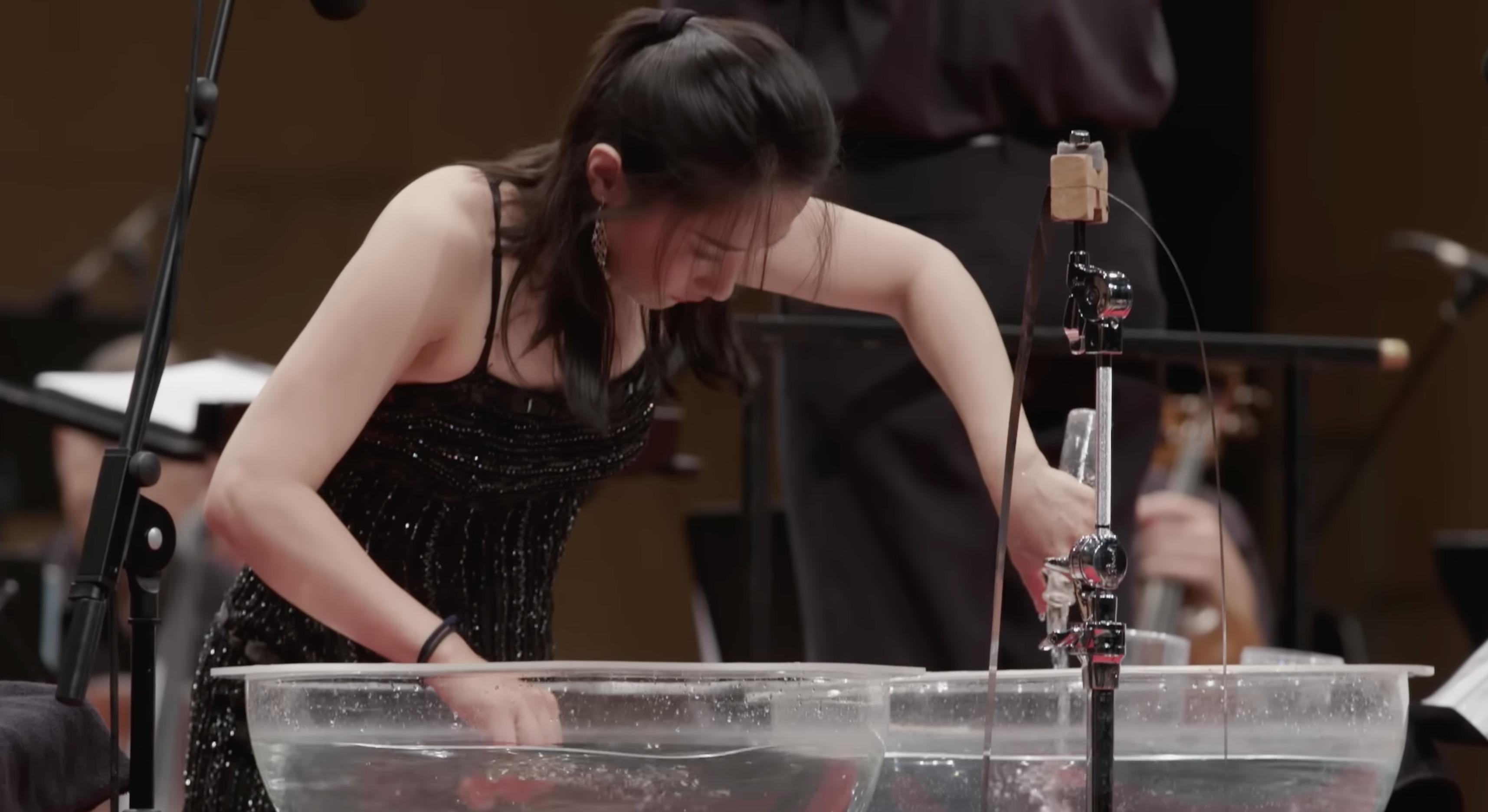 Beibei Wang, a professional percussionist, uses water as her main instrument in a 2019 concerto performance.