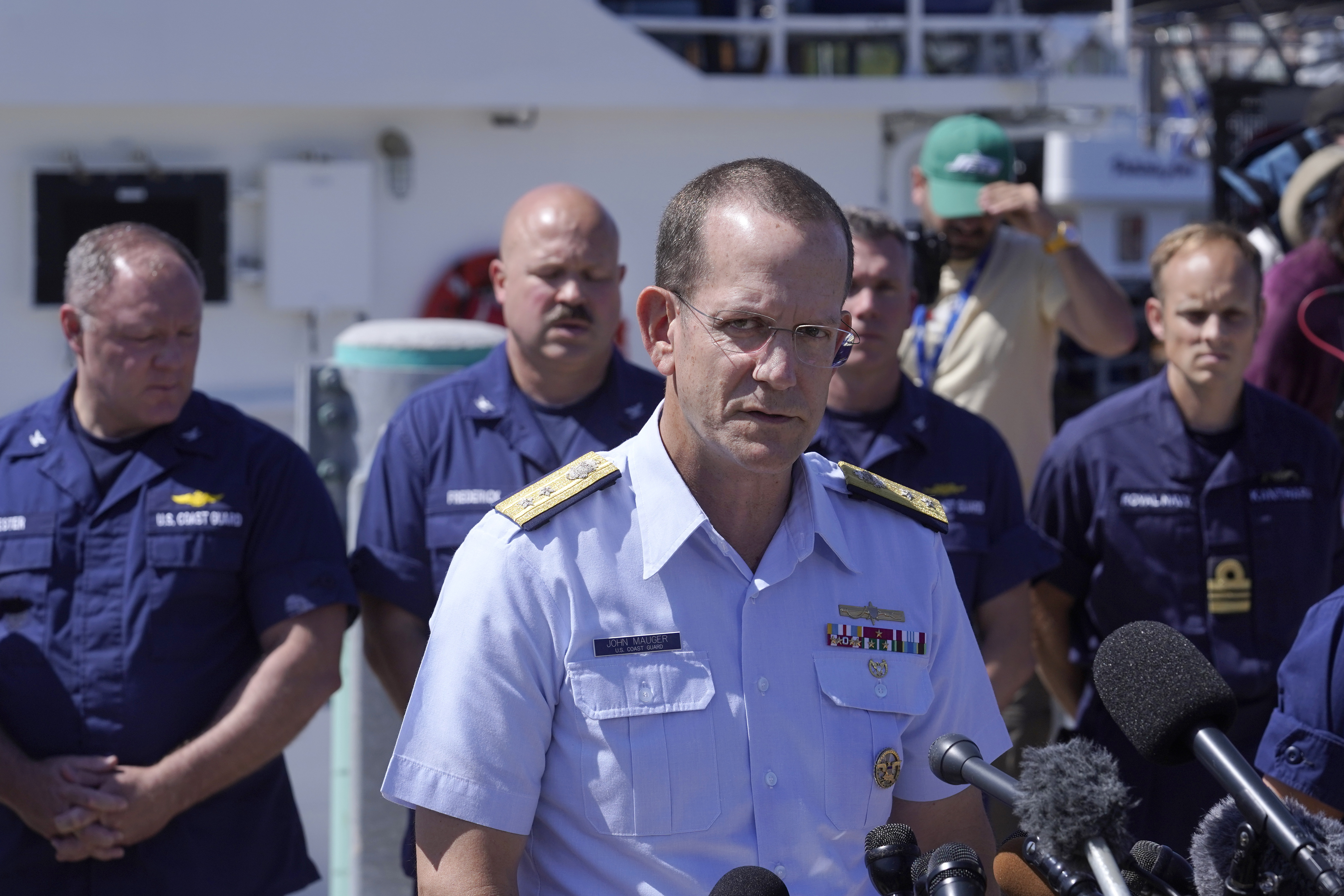 U.S. Coast Guard Rear Adm. John Mauger, commander of the First Coast Guard District, talks to the media Thursday at Coast Guard Base Boston, in Boston. The missing submersible Titan imploded near the wreckage of the Titanic, killing all five people on board, according to the U.S. Coast Guard.