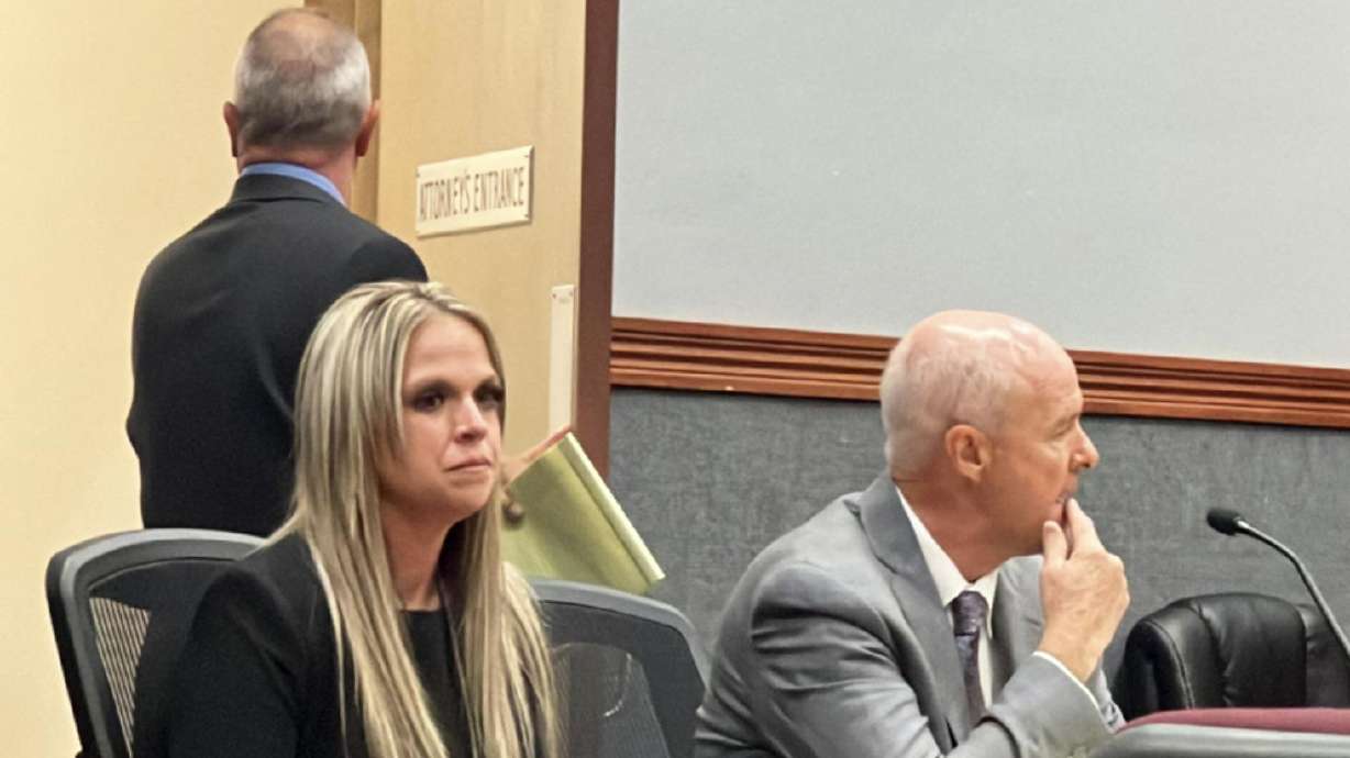 Courtney Goody sits beside her defense attorney, Curtis Smith, before Wednesday’s sentencing hearing. Courtney Goody pleaded guilty to two counts of misdemeanor battery for poisoning her then-husband in 2020.