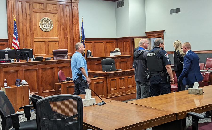 Courtney Goody leaves the courtroom in the custody of officers. Courtney Goody pleaded guilty to two counts of misdemeanor battery for poisoning her then-husband in 2020.
