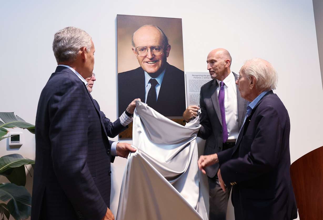 A portrait of James B. Lee is unveiled at the James B. Lee Justice Center ceremony in Salt Lake City on Thursday.