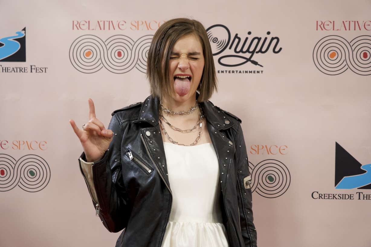 Lead singer Kjersti Long, 16, poses on the red carpet at the premiere of "Relative Space: An Atypical Musical" in Pleasant Grove on Thursday.