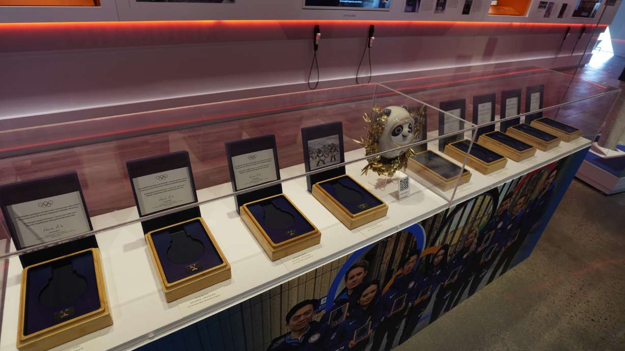 Nine empty boxes, which belong to members of the U.S. figure skating team who finished in second place last year in the Winter Olympics in Beijing, sit in a display case in the U.S. Olympic and Paralympic Museum on Thursday, June 22, 2023, in Colorado Springs, Colo. The figure skaters have not received their medals while a doping case involving a Russian skater plays out.