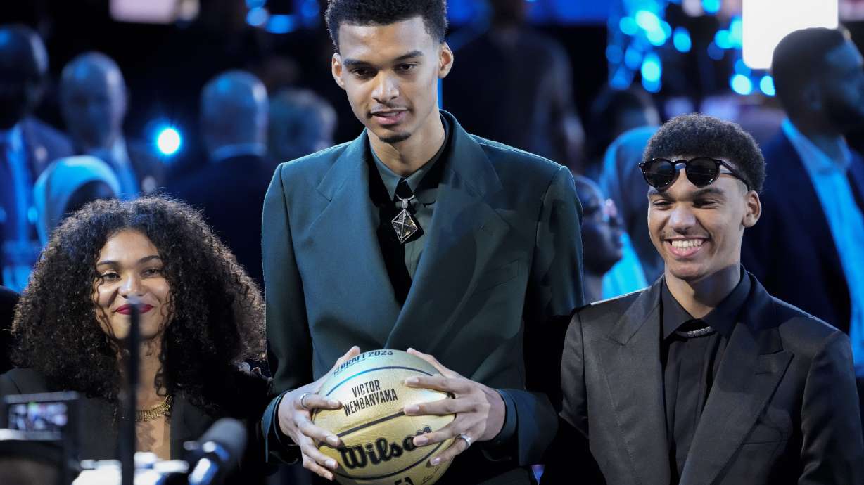 Victor Wembanyama reacts during introductions before the NBA basketball draft, Thursday, June 22, 2023, in New York.