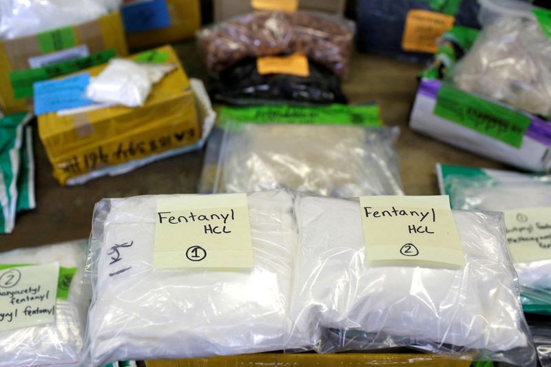 Plastic bags of Fentanyl are displayed on a table at the U.S. Customs and Border Protection. The U.S. Justice Department on Friday filed criminal charges against four Chinese chemical manufacturing companies and eight individuals over allegations they illegally trafficked the chemicals used to make fentanyl.
