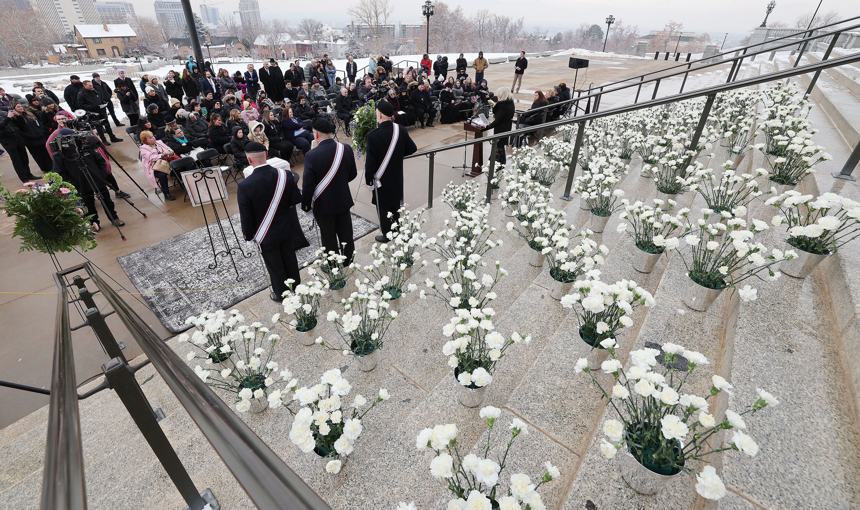 White carnations representing each of the 1,746 unborn babies that were aborted in Utah in 2022 are displayed during an anti-abortion memorial service at the Capitol in Salt Lake City on Jan. 25.