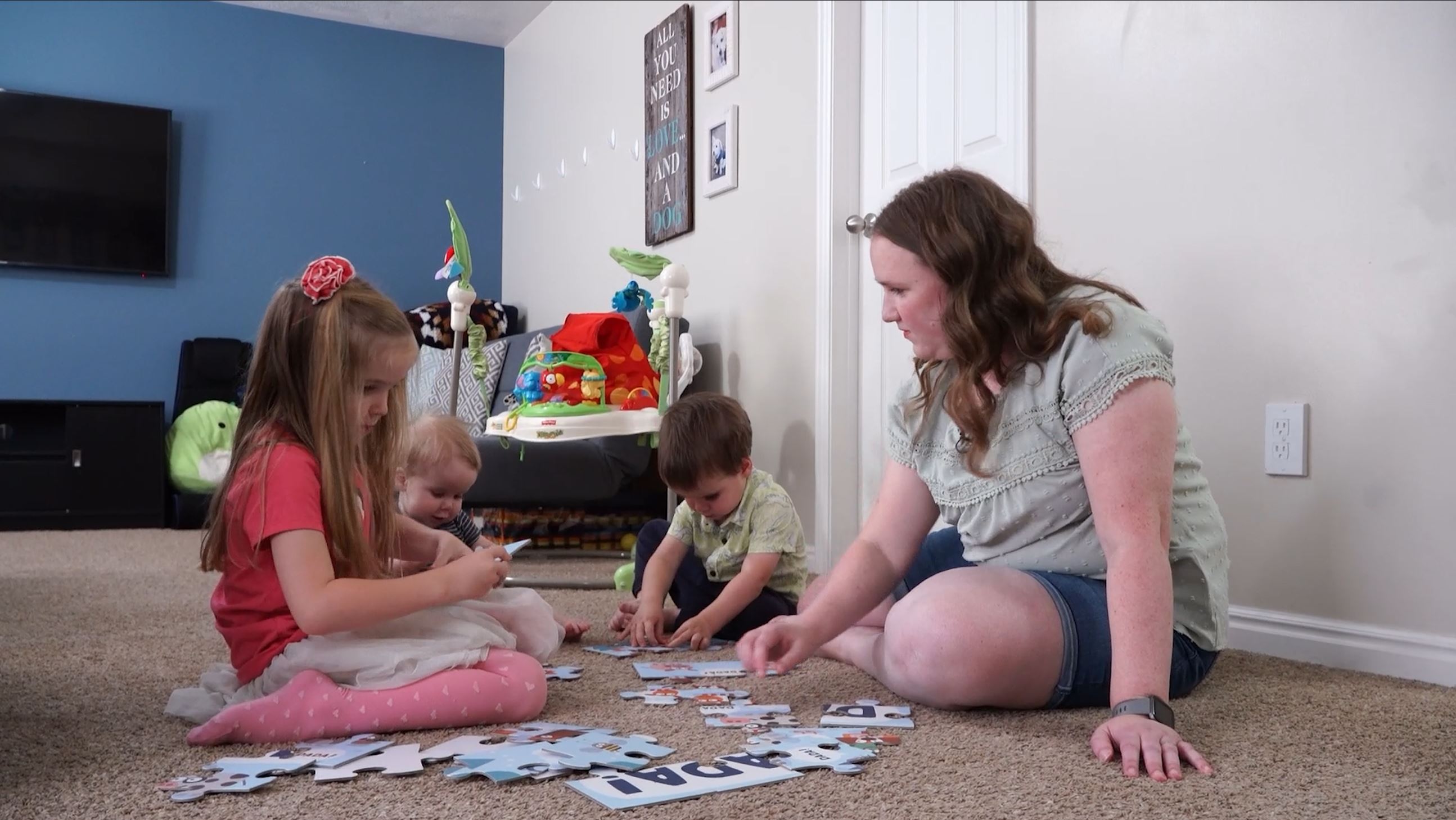 Kristin Arnold plays with her children in their home. For Arnold, being a mom was always in the plans. But suffering from perinatal mood and anxiety disorders was not in her plans. After healing from those disorders, three times over, she's sharing her story to help other mothers know how important it is to reach out for help.