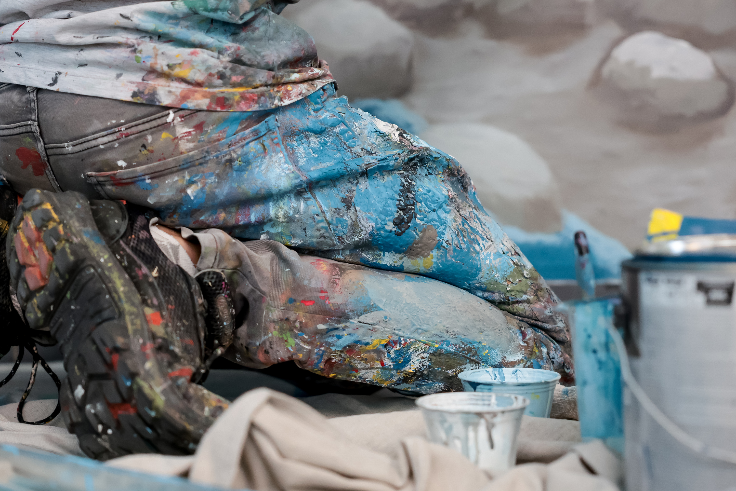 Argentinian artist Franco Cervata Cozza, who also goes by the artist name Vato, paints a mural at the George S. and Dolores Doré Eccles Wildlife Education Center in Farmington on Saturday.