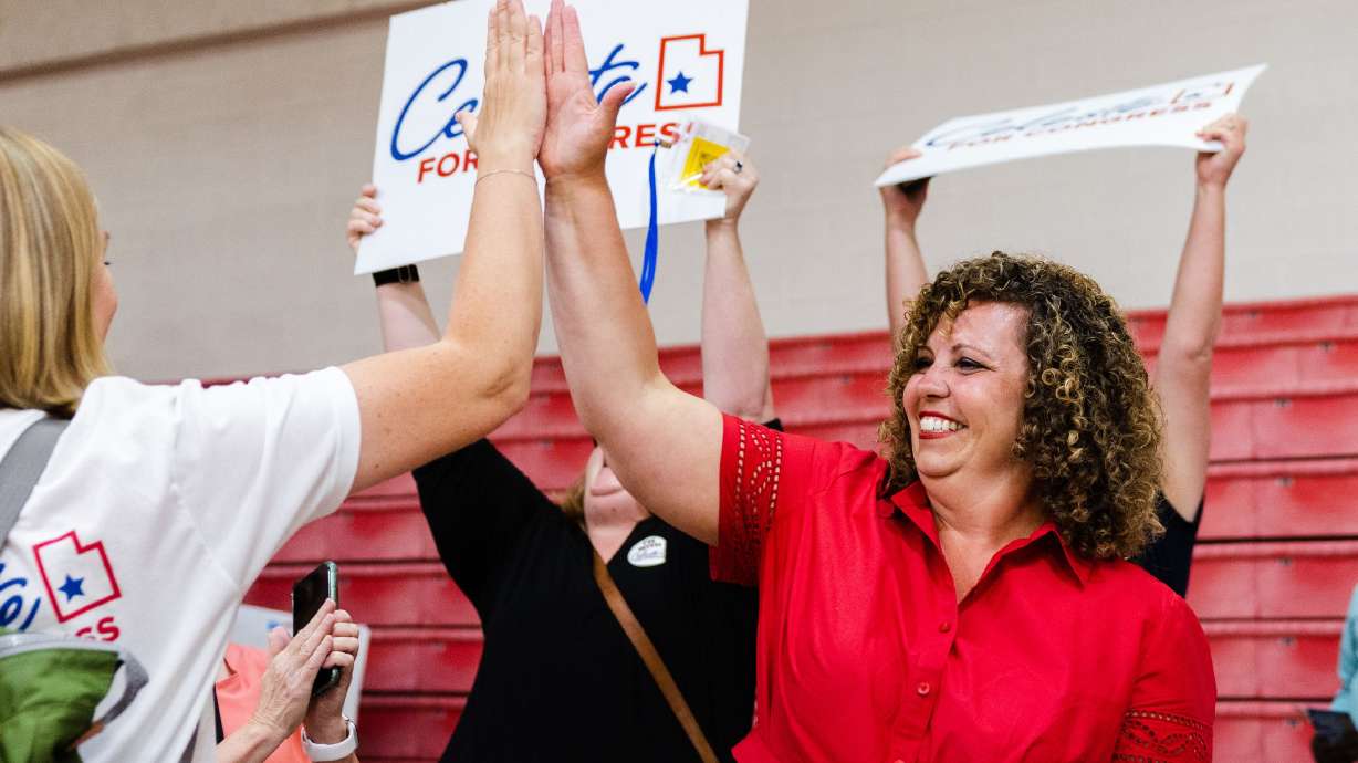 Celeste Maloy high-fives a supporter at the Utah Republican Party’s special election in Delta on June 24. A judge denied a request Monday to have her name removed from the ballot.