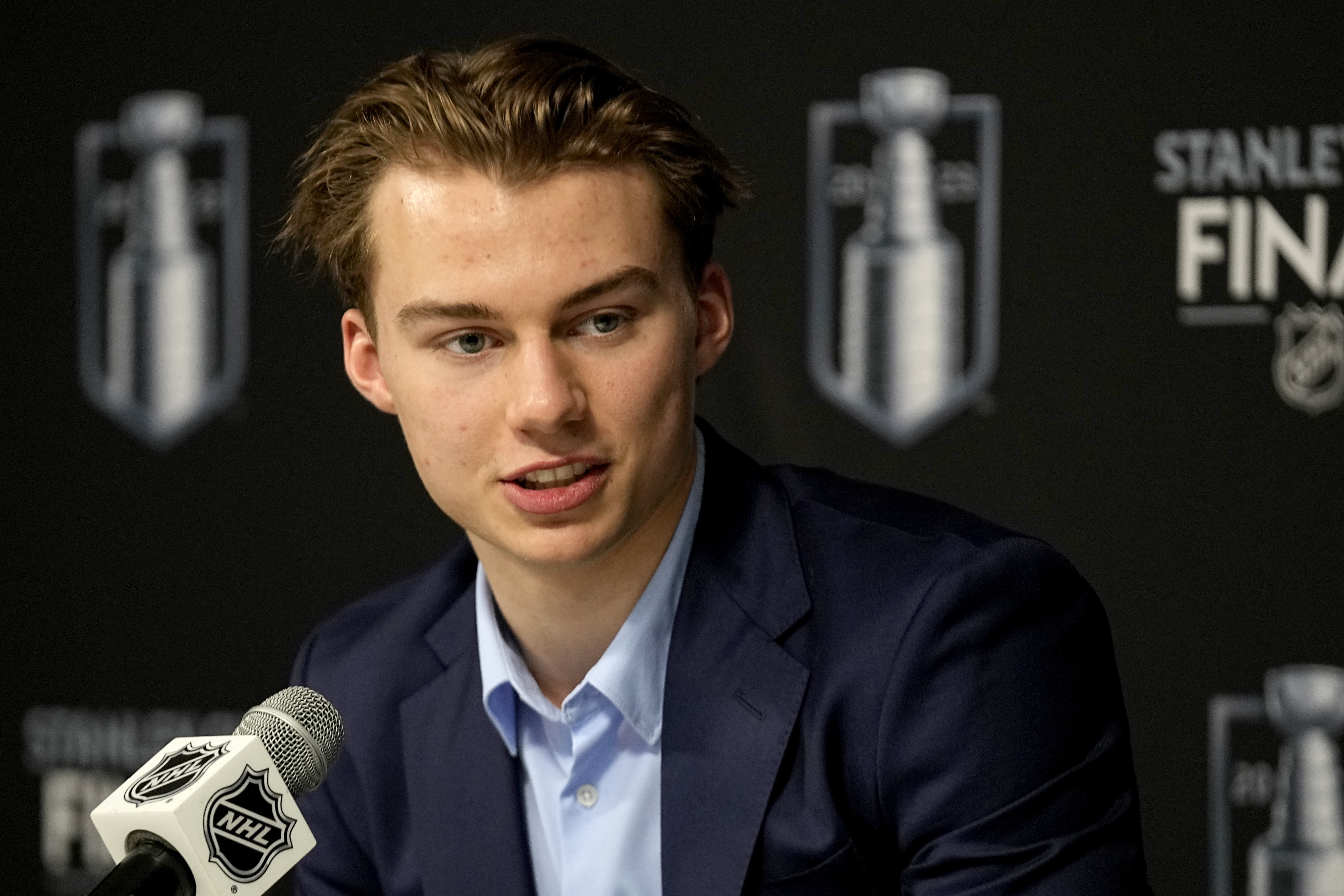 FILE - NHL draft prospect Connor Bedard speaks to the media prior to Game 2 of the NHL hockey Stanley Cup Finals between the Florida Panthers and the Vegas Golden Knights, June 5, 2023, in Las Vegas. Bedard, from British Columbia, is anticipated to be selected by the Chicago Blackhawks with the No. 1 pick in the NHL draft Wednesday, June 28, 2023. 