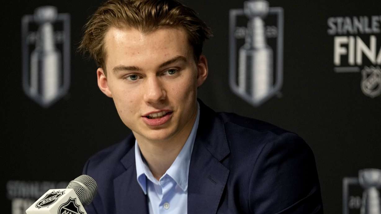 FILE - NHL draft prospect Connor Bedard speaks to the media prior to Game 2 of the NHL hockey Stanley Cup Finals between the Florida Panthers and the Vegas Golden Knights, June 5, 2023, in Las Vegas. Bedard, from British Columbia, is anticipated to be selected by the Chicago Blackhawks with the No. 1 pick in the NHL draft Wednesday, June 28, 2023.