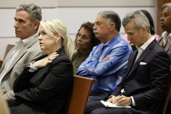 Gena and Tom Hoyer, left, and Max Schachter, right, listen during closing arguments in the trial of former Marjory Stoneman Douglas High School School resource officer Scot Peterson, Monday, at the Broward County Courthouse in Fort Lauderdale, Fla.