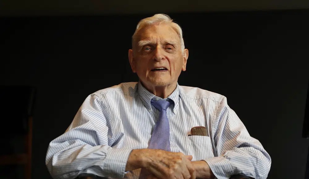 Nobel chemistry winner John B. Goodenough poses for the media at the Royal Society in London Oct. 9, 2019. Goodenough died Sunday, the University of Texas announced Monday. He was 100. 