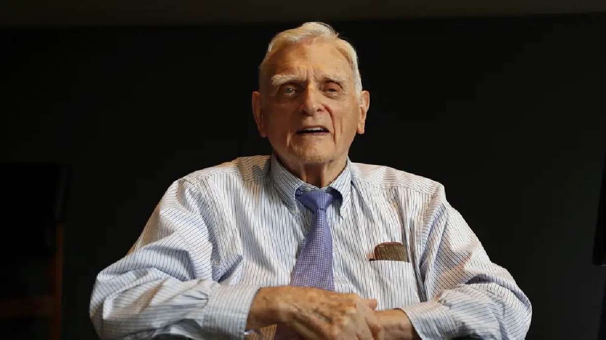 Nobel chemistry winner John B. Goodenough poses for the media at the Royal Society in London Oct. 9, 2019. Goodenough died Sunday, the University of Texas announced Monday. He was 100.