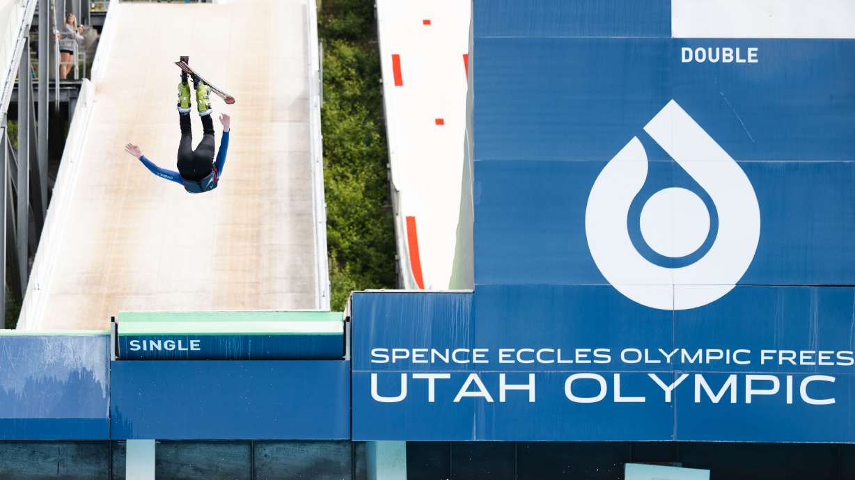 A participant jumps off a ski ramp at the Utah Olympic Park in Park City on June 23. Salt Lake City could be on its way to hosting another Winter Games as soon as October, an official said.