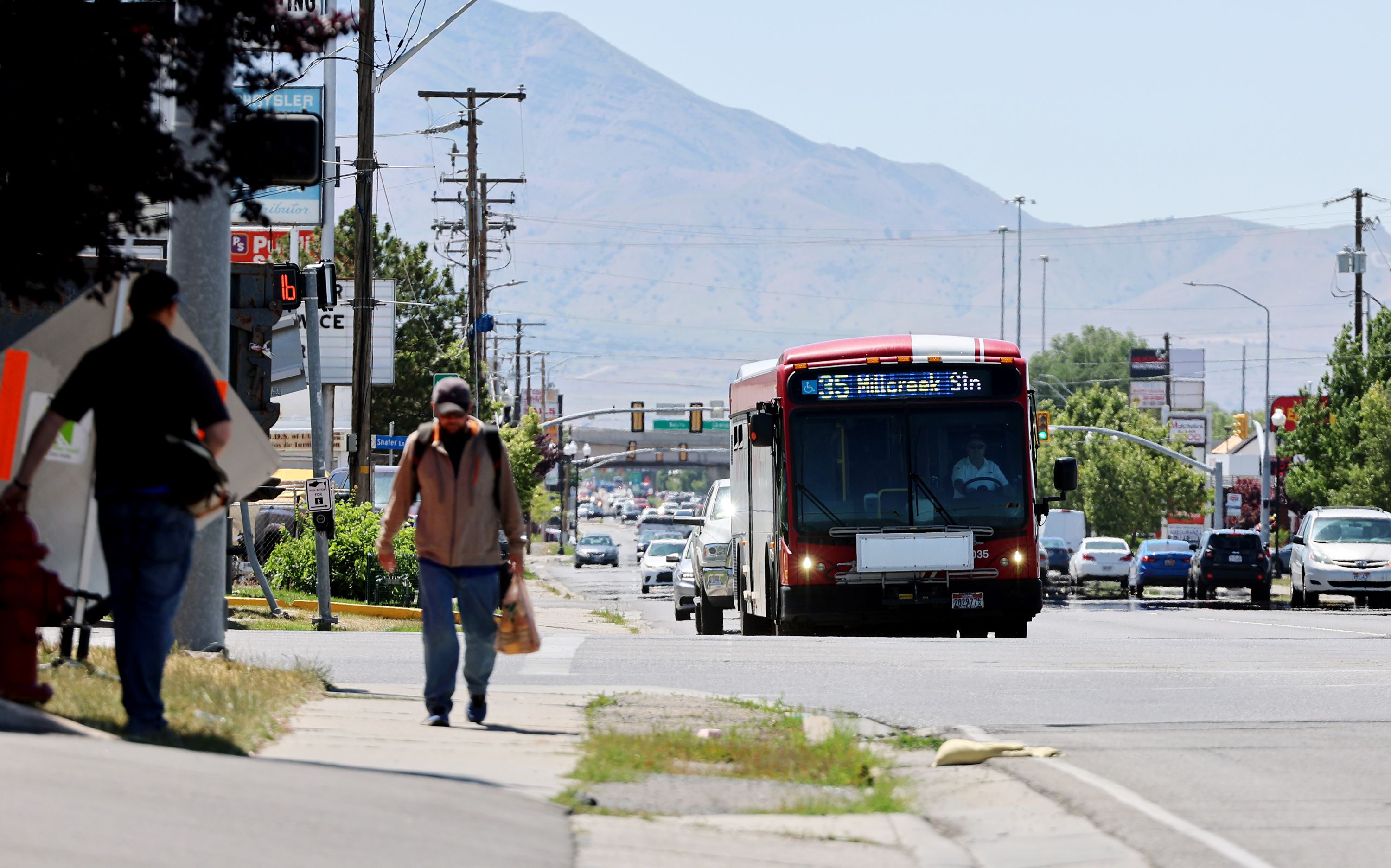 A Utah Transit Authority bus moves east on 3500 South at Redwood Road in West Valley City on Monday.