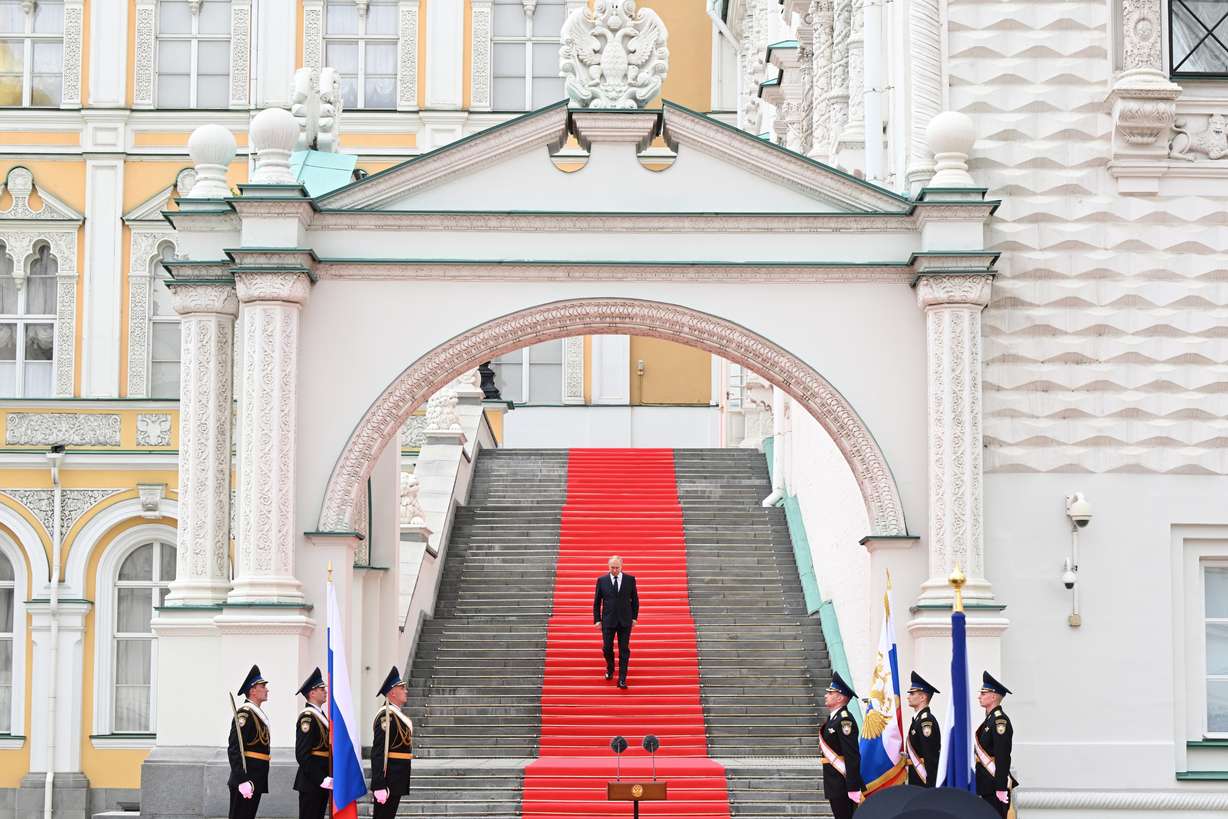 Russian President Vladimir Putin arrives to deliver a speech to the units of the Russian Defense Ministry, the Russian National Guard, the Russian Interior Ministry, the Russian Federal Security Service and the Russian Federal Guard Service, who ensured order and legality during the mutiny, at the Kremlin in Moscow, Russia, Tuesday.
